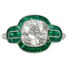 Vintage 2.20 Carat Old Mine Cushion Diamond and Emerald Platinum Filigree Ring