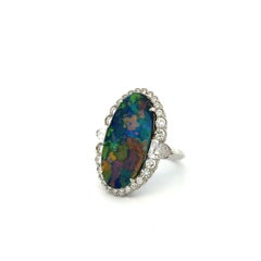 Vintage 7.53 Carat Oval Black Opal and Shield & RBC Diamond Platinum Ring