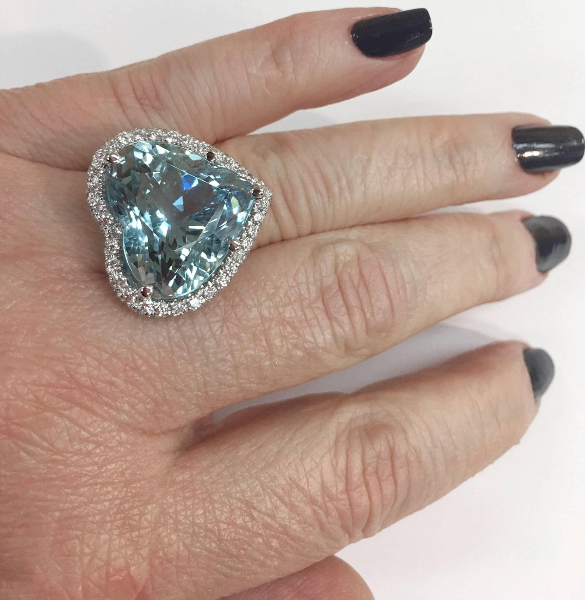 Elegant & finely detailed Natural Aquamarine Heart shaped Ring surrounded by 160 brilliant round cut diamonds in a beautifully handmade 18 karat white gold setting . Great attention to detail! The Aquamarine has rolling sparkle! 1 Heart shaped
