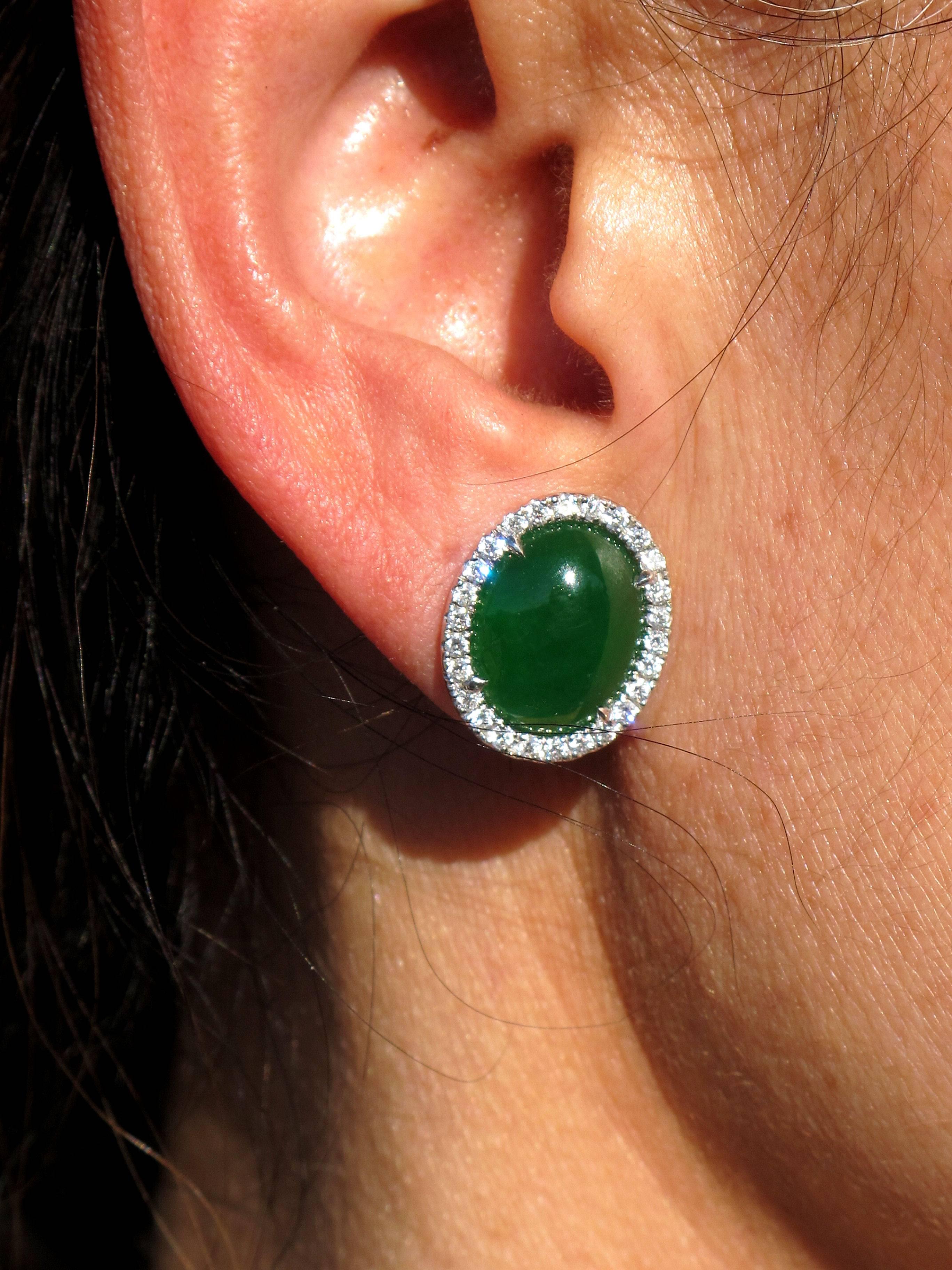 Featuring a pair of Beautiful Oval Cabochon cut Natural Jadeite Jade measuring approx. 13.48 x 10.06 x 4.18mm; 4.71 ct and 13.49 x 10.49 x 4.02mm; 4.56 ct; total 9.27ct, vivid green; Burma, (N) Type A = not enhanced; FTIR-tested; 