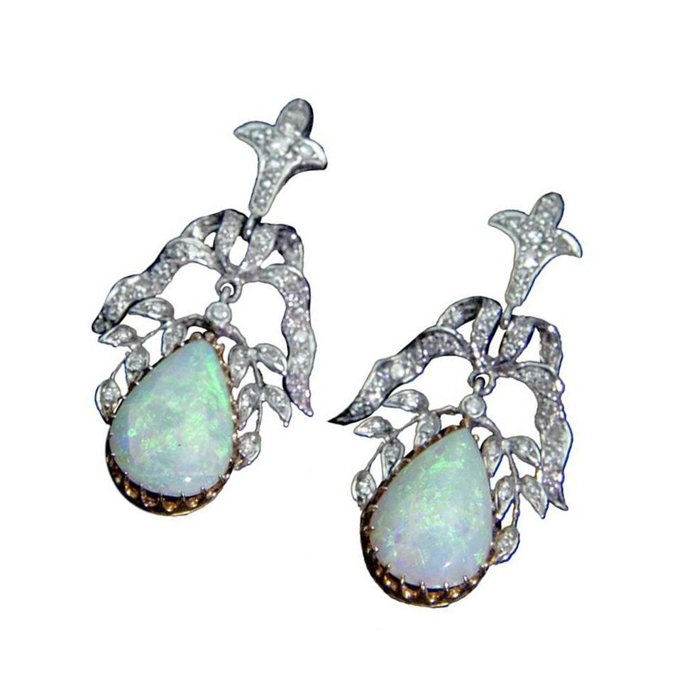 Beautiful pair of perfectly matched opal pear/teardrop shape drops, handmade and delicately framed in two-tone 14k yellow and white gold with diamonds; The colorful gemstones display an iridescent palette of pastel green, blue and peach colors;