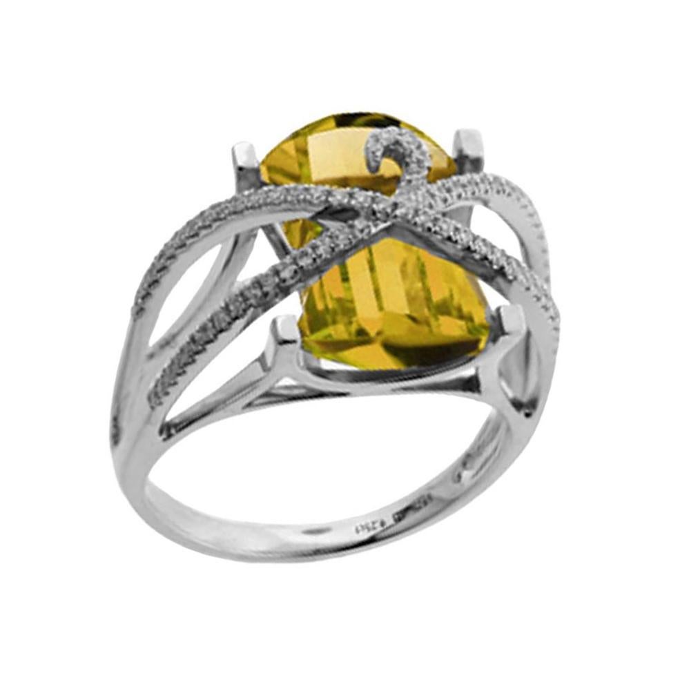 Beautiful Citrine ring elegantly wrapped by seventy brilliant-cut round Diamonds, weighing approx. 0.354 ct., rectangular dome facet-cut Citrine measures approx. 14mm x 11mm x 7mm; beautifully crafted in 14k white gold with open gallery. Ring size: