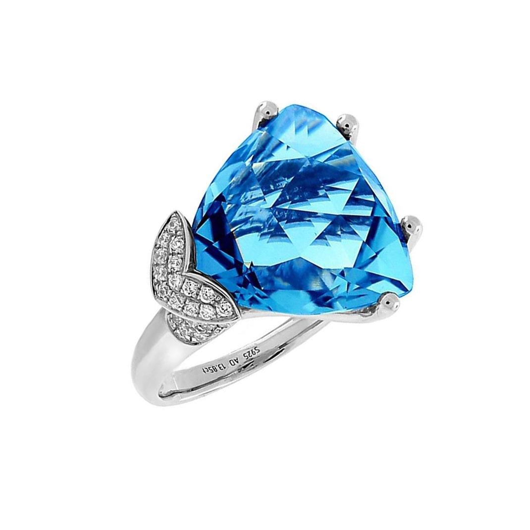 Taille mixte Bague de succession en or avec topaze bleue suisse et diamant - Bijouterie d'art en vente