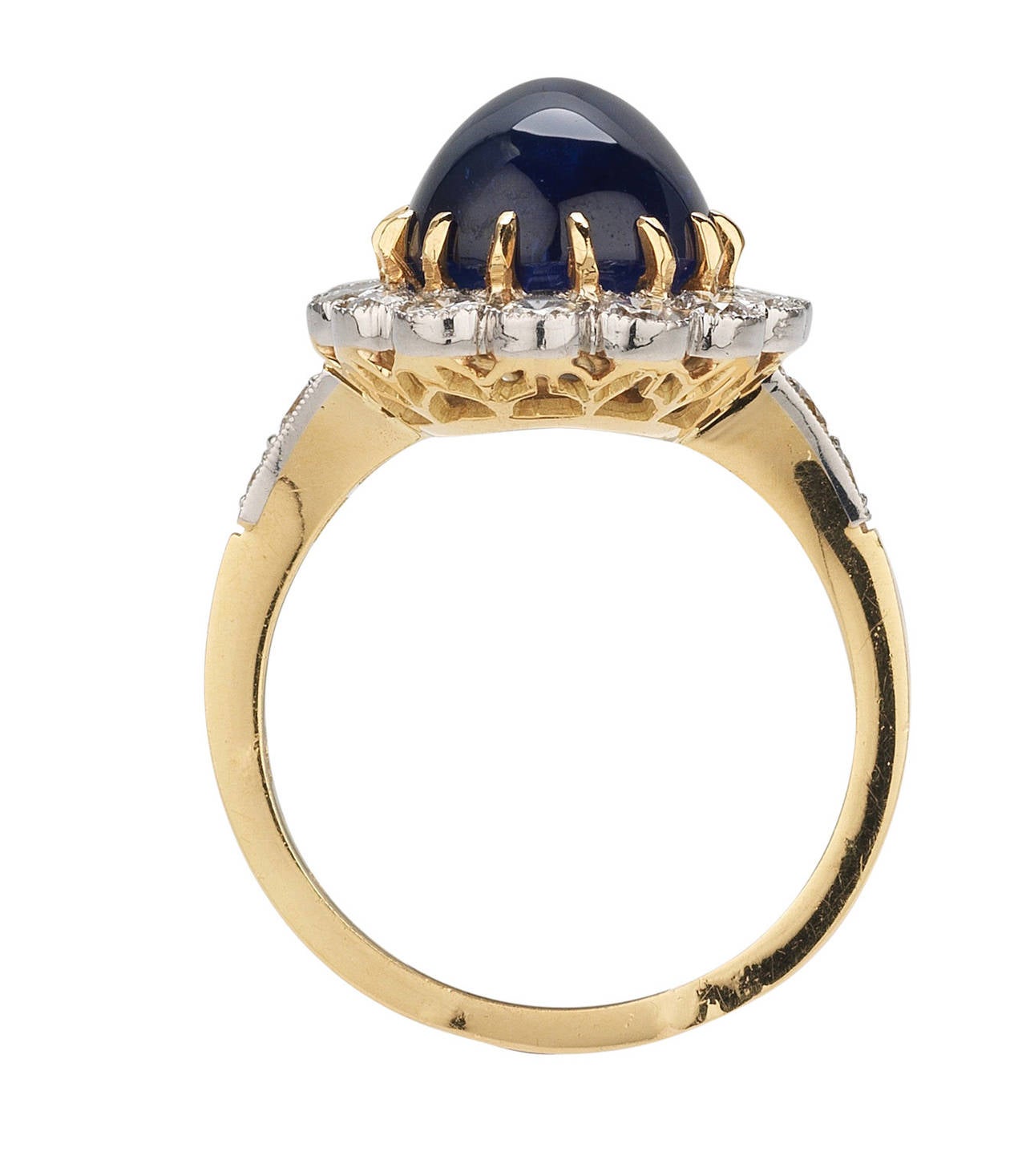 Platinum and yellow gold (18kt) cabochon Sapphire and Diamond Ring. French marks.

Total weight of the diamonds: 1.35 carats
In addition the weight of the center cabochon Sapphire: 8.33 carats
(The Sapphire is natural and heated. It does not