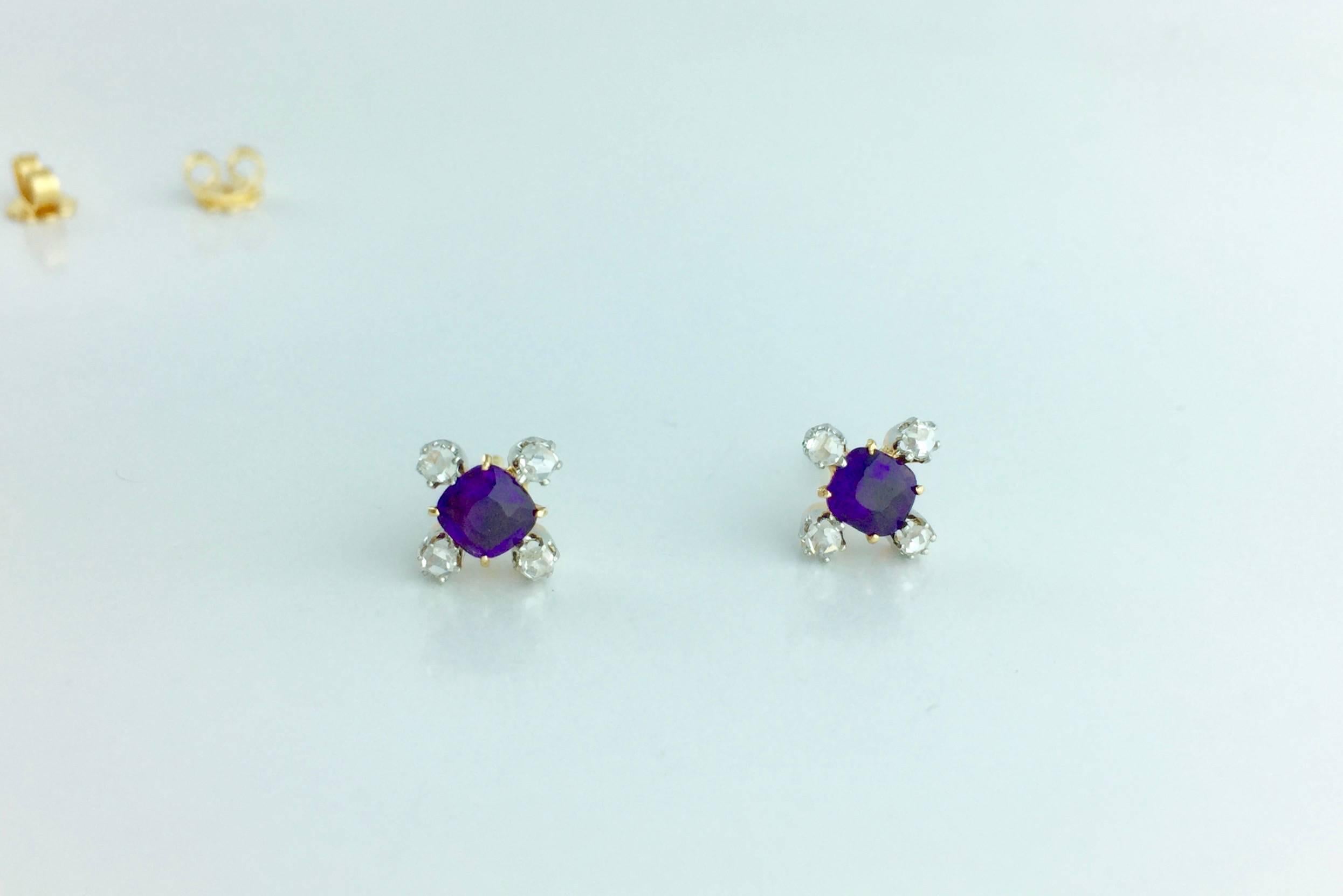 You will fall in Love with this pair of Ear Studs!
Old-mine cut Amethysts each one surrounded by four Rose-cut diamonds all mounted on yellow gold 585 14k and post fittings in gold 750 14k.
Front part circa Early XXth Century. Back part