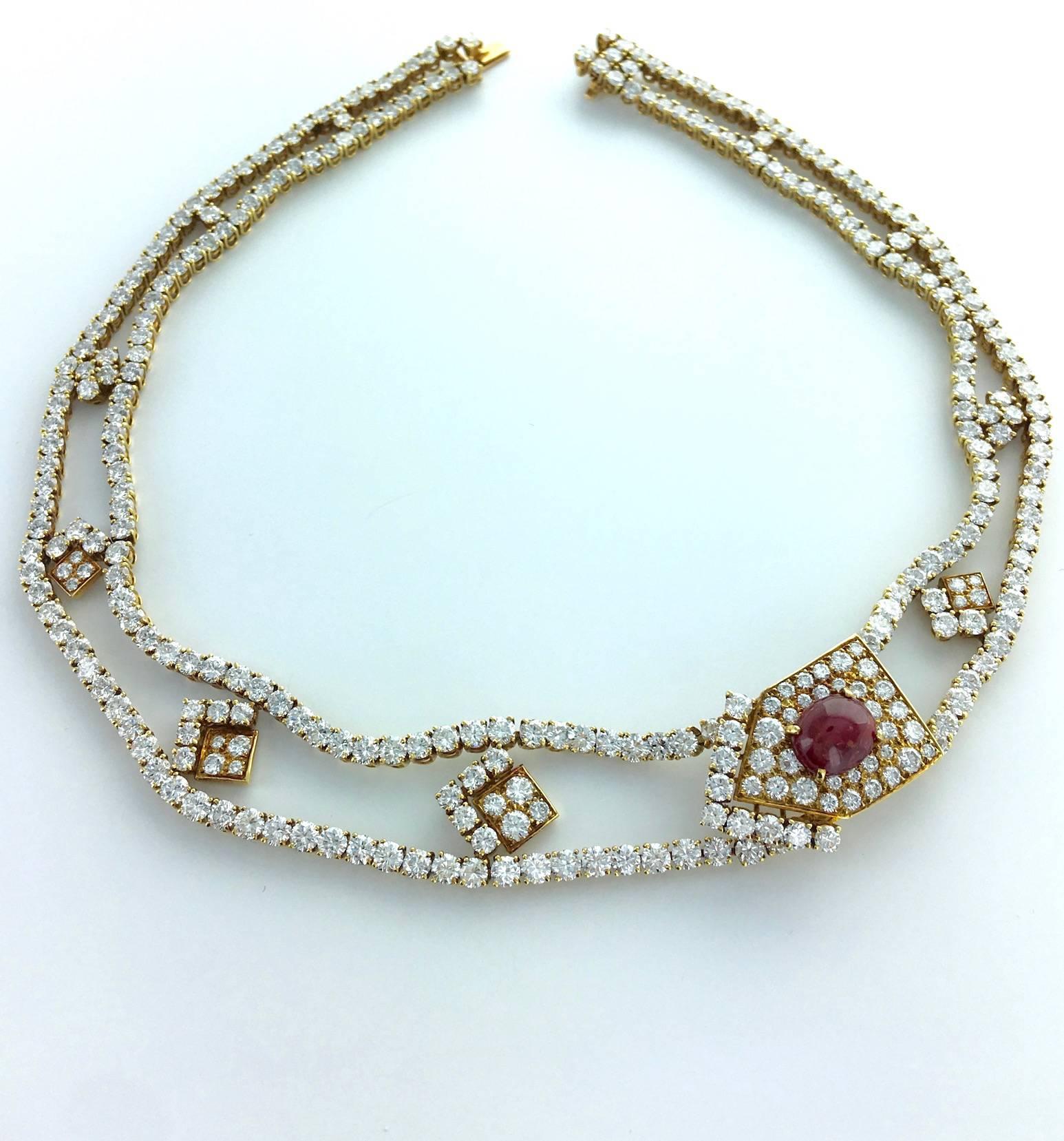 M. Gerard realized magnificent sets in the 60's and 70's from the Van Cleef and Arpels' same jeweler workshop Andre Vassort.
He always used the best quality of Diamond.
This set is in yellow gold 18k 750, with cabochon Rubies and composed by a