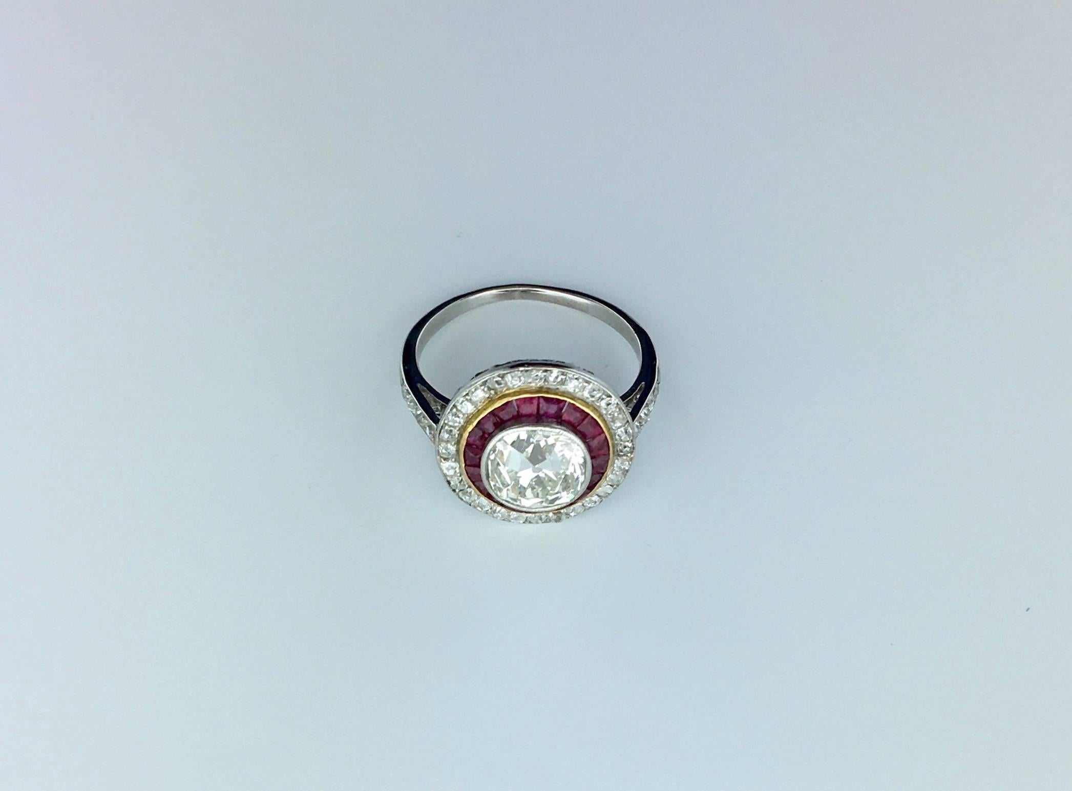 More than 1.30 carats old mine diamond mounted in platinum 850 and 18k gold 750 Art Deco ring surrounded by calibrated ruby and old mine diamond, circa 1925
Gross weight: 4.00 g.
Size Us 5, Eur 49.5 