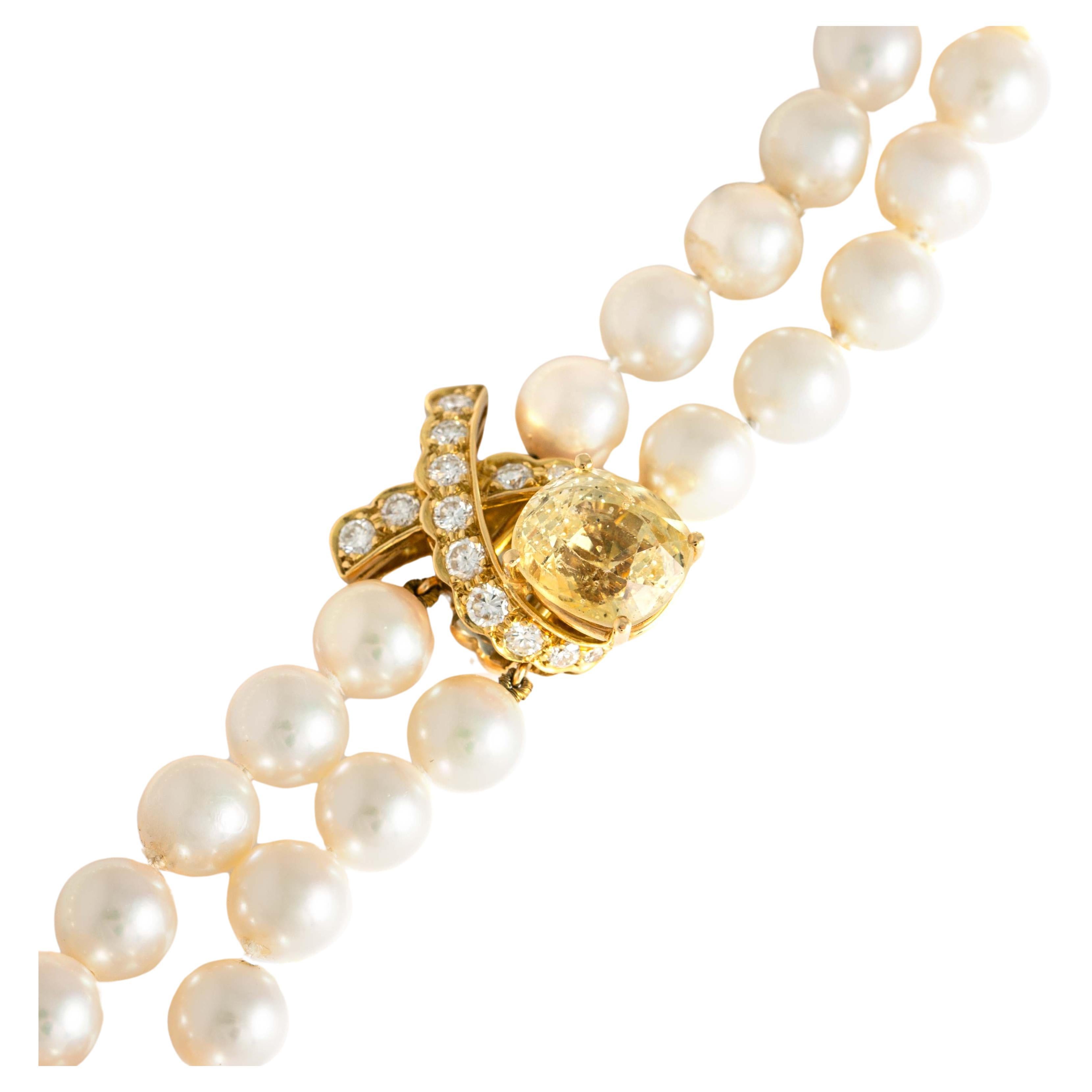 Gubelin, collier à fermoir en or jaune 18 carats avec saphir jaune, diamant et perle, années 1980