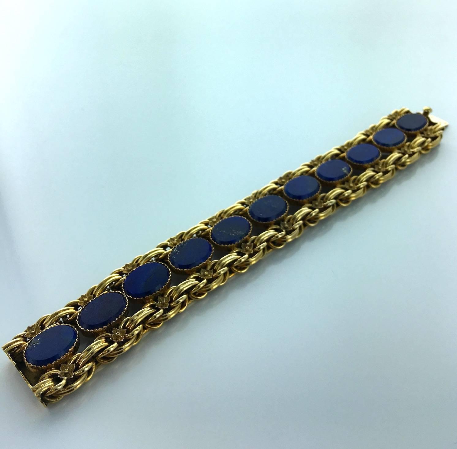 A yellow gold and lapis lazuli Victorian bracelet in its fitted case.
French marks and maker's mark P.P.
XIXth Century

Measures:
Length: 20 cm (7.9 inches)
Width: 3 cm (1.2 inches)

Total weight: 76.00 grams.