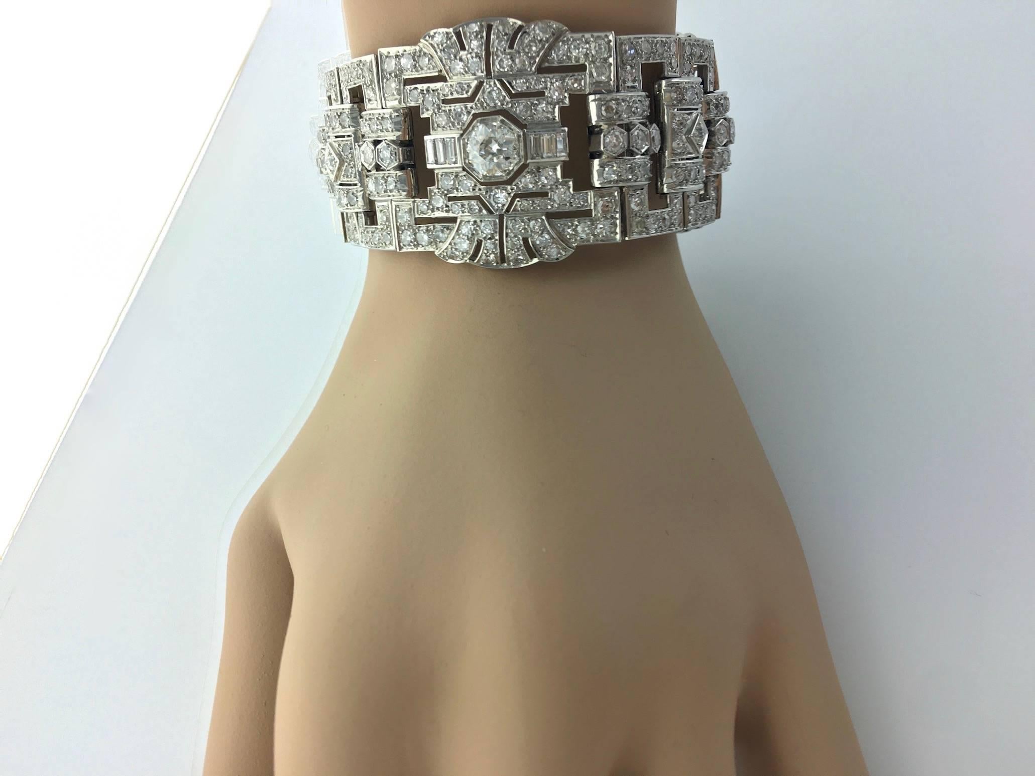 Again and Always this significant bracelet shows how the Art Deco period was prolific.
All platinum and Old-mine cut Diamond. 
We estimate a total weight approx. 20.- carats.

Length: 7.09 inches.
Width: 1.18 inches.
French marks.
Circa