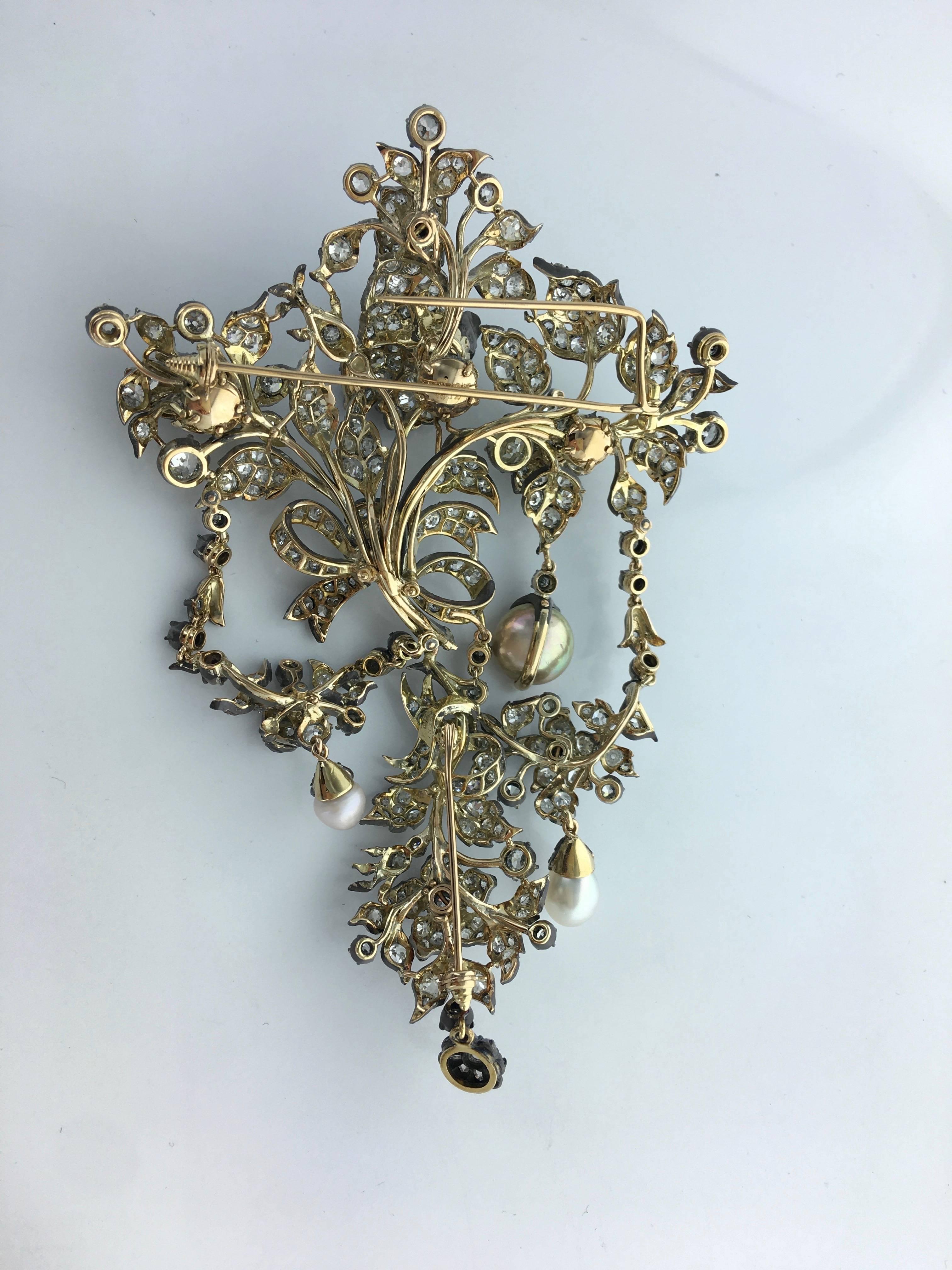 Unique and Awesome En Tremblant Stomacher Brooch.
Old-mine cut Diamond and Natural Pearl (not tested) mounted on silver and gold.
The size of this Museum piece is significant. Fitted case.
Dated 1832 (engraved). 
Signed E. Pierret.

Total height: