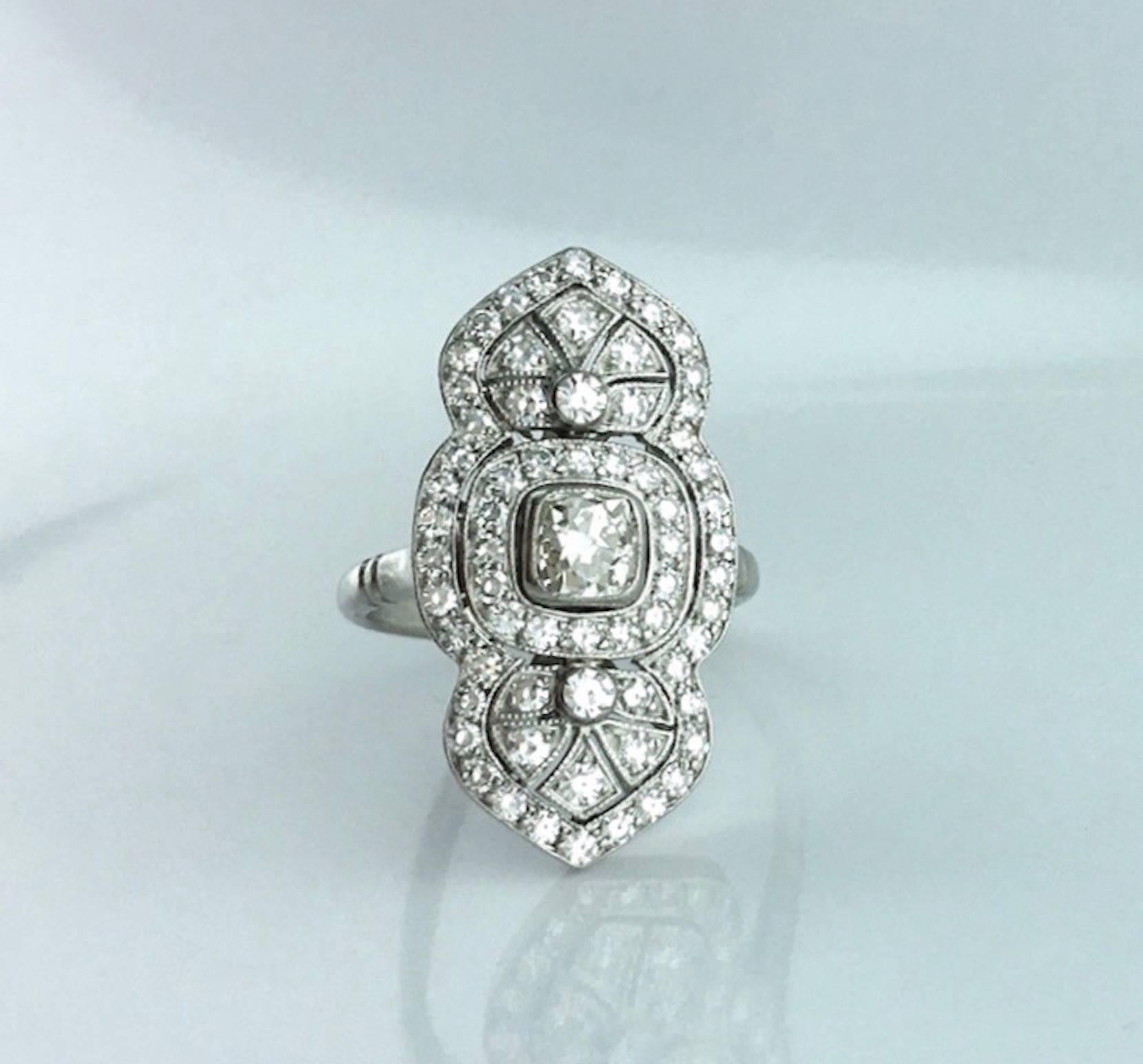 Awesome Art Deco design with Indian inspiration, this Platinum and Diamond (total approximately 1.60 carats) Ring is Stunning.
French marks.
Contemporary.

Gross weight: 7.9 grams.