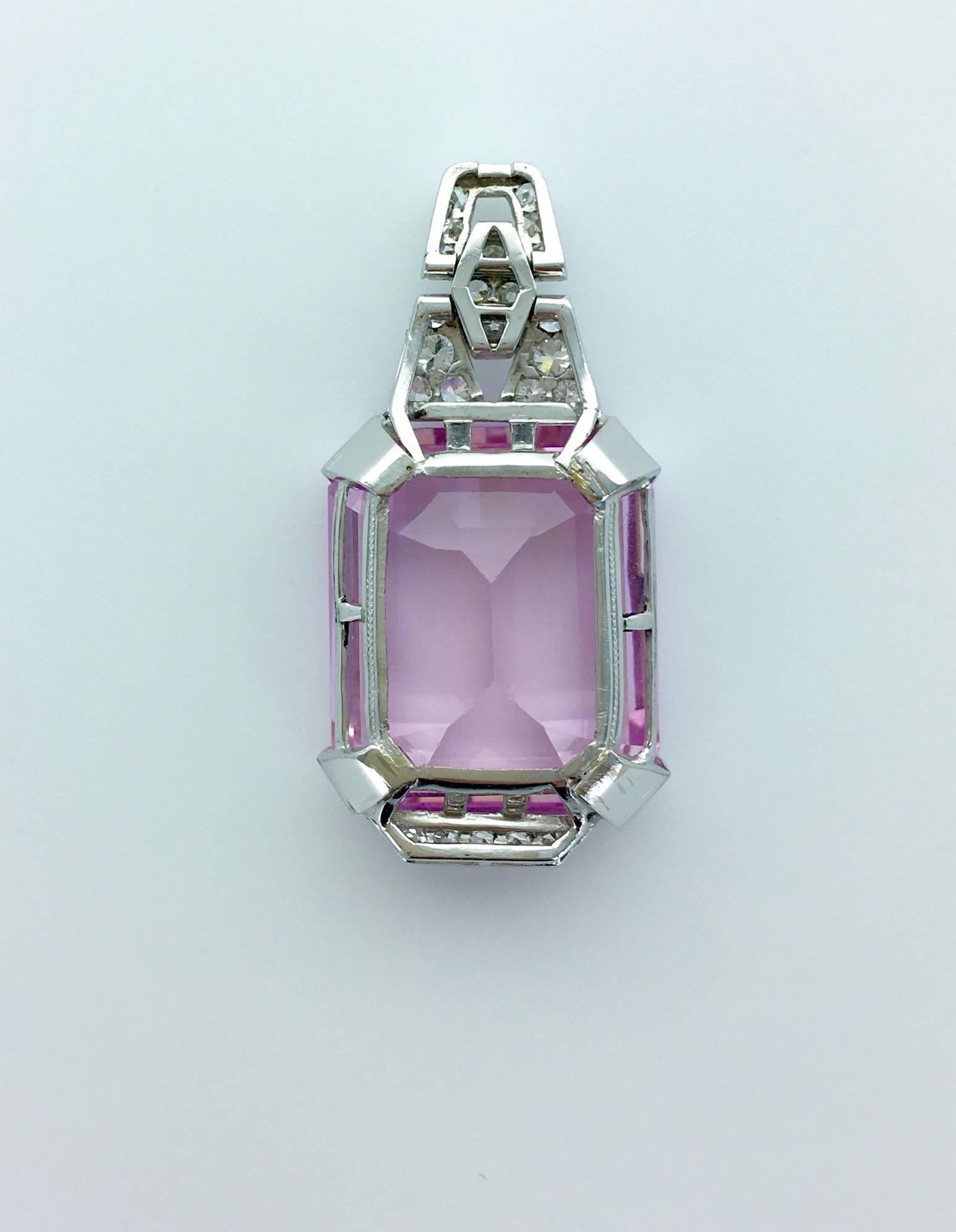Impressive and Sweet Pink color Natural Morganite weighting 35.72 carats. The Pendant mounting in Diamond and Platinum.
Circa 1935.

The Morganite is accompanied by a Swiss Laboratory GemtechLab certificate.

Gross weight: 14.02 grams.