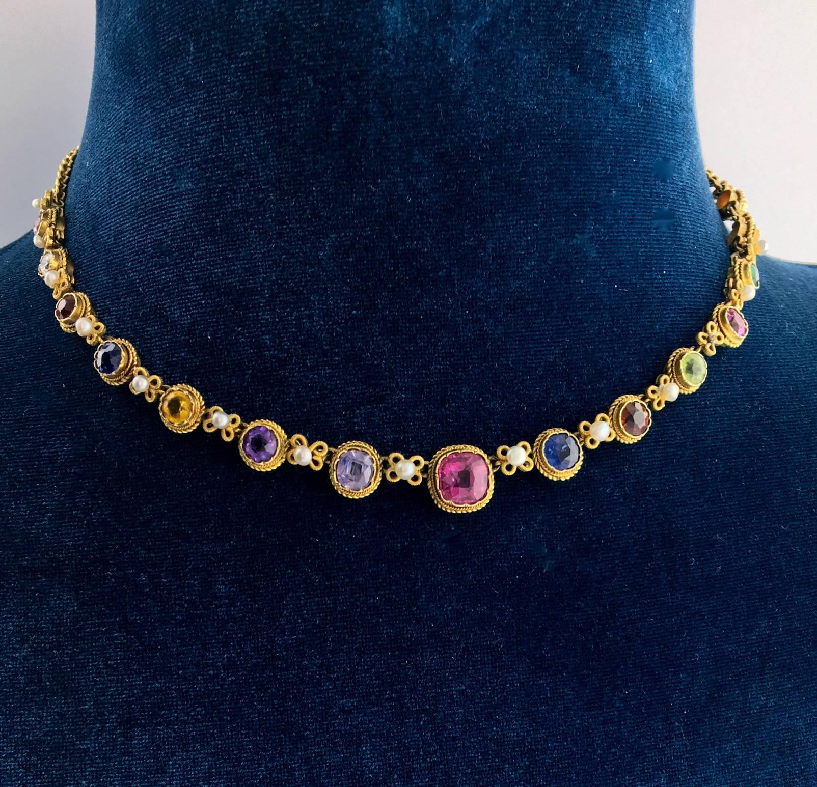 Beau-Ti-Ful! This Multi-Gem, Natural Pearl Necklace in yellow gold is very rare. 
All precious and Semi-Precious stones: Diamond, Emerald, Sapphire, Amethyst, Tourmaline, Citrine, Garnet, Spinel, Peridot.
Late XIXth-Early XXth Century.

Gross