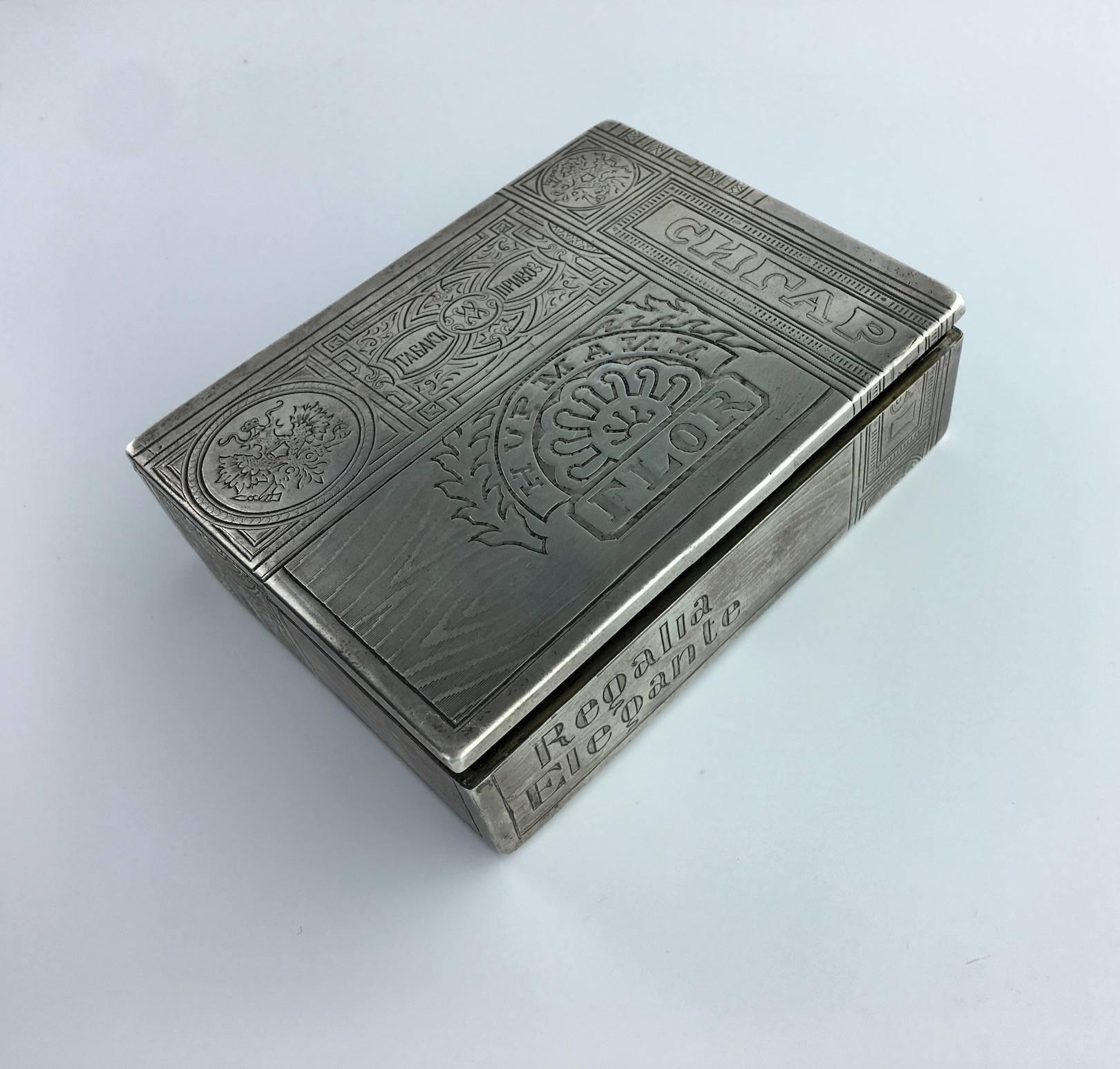 Top of the Top! This Cigar box is stunning with Russian inscriptions and Cuban cigar brands illustrations. Massive Silver (vermeil inside).

Russian marks.
Mid 20th Century.