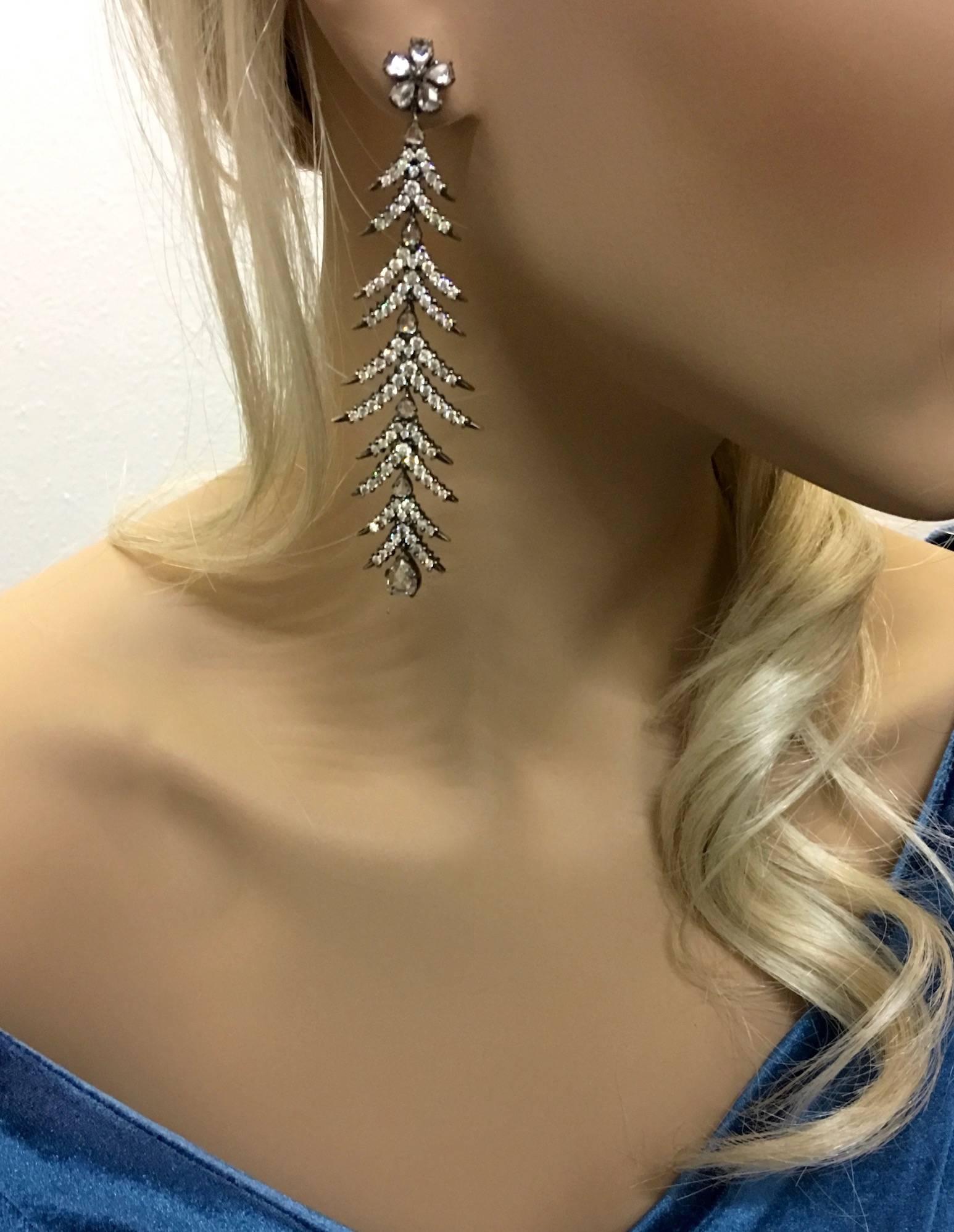 Diamond and Rose-cut Diamond on Black Gold Earrings Pendants.
Significant length.