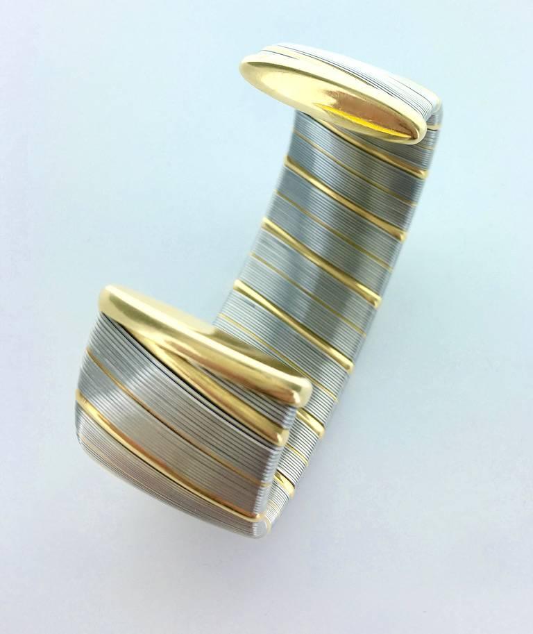 Women's or Men's 1970s Cartier Gold and Steel Bangle