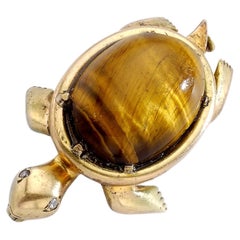 Vintage 1960s French Tiger's Eye Cabochon on Yellow Gold 18 Karat Turtle Brooch Clip