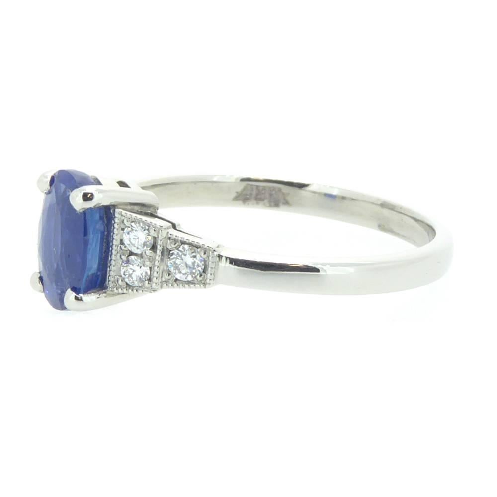 Created in our own jewellery workshops and referencing the 1920s, this is a stunning Art Deco style ring with a design feature of stepped shoulders redolent of the decadent Roaring Twenties.

The rich, royal blue, oval sapphire is held in four white