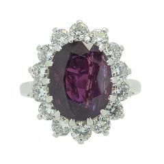 4.50 Carat Oval Ruby Diamond Gold Cluster Ring