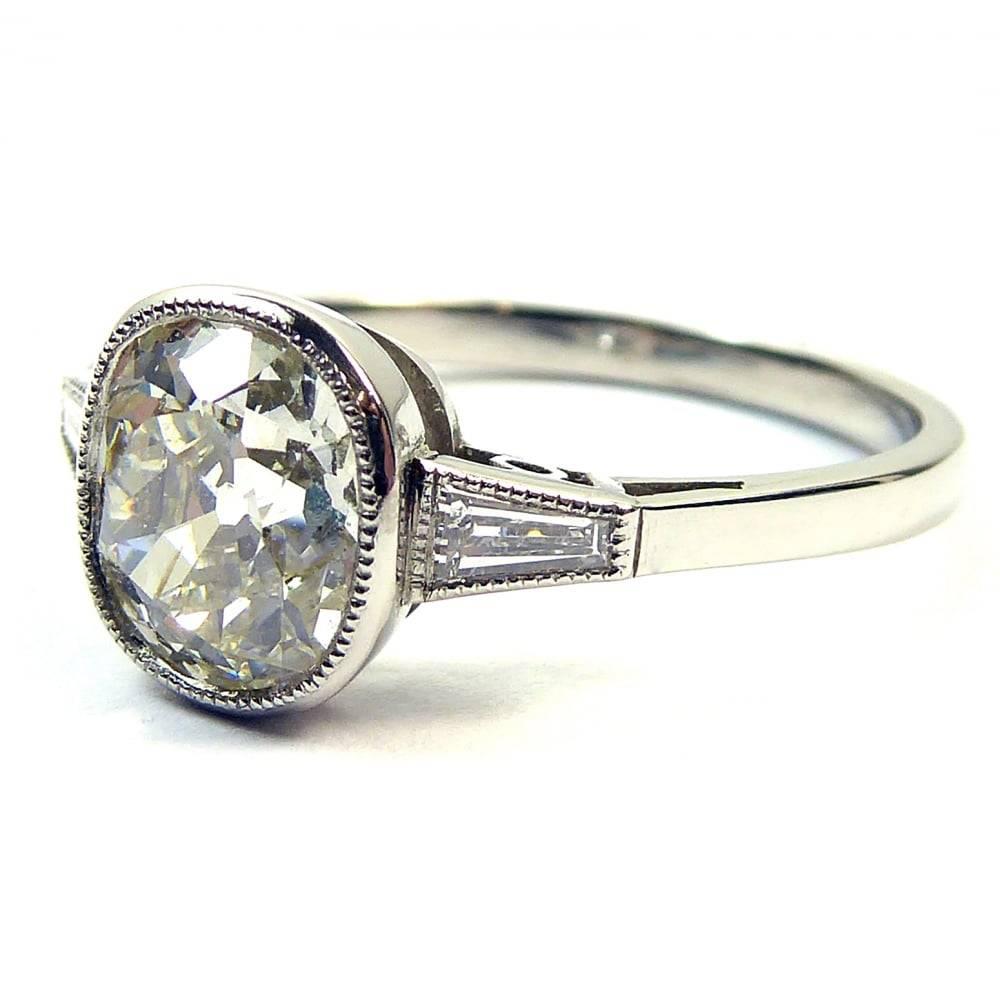 Details   
    1 x old european cut diamond
    1.60ct
    Assessed SI clarity, I/J colour
    2 x tapered baguette cut diamonds
    0.17ct total
    Assessed VS carity, G/H colour
    Hallmarked platinum

If a diamond can ever be described as