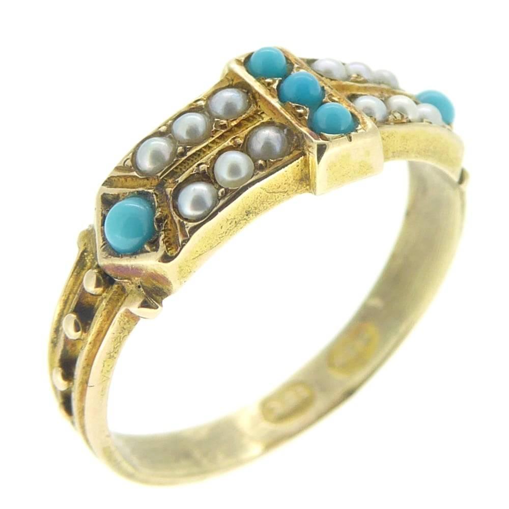     Details
    Victorian, Circa 1880s
    Cabochon tuquoise
    Pearls
    Stamped 15c 
    Finger size 6 1/2 (US/Canada); N (UK/Australia)
    Approx 7.0mm wide (max.)

Victorian turquoise and pearl ring in yellow metal stamped 15ct and testing as