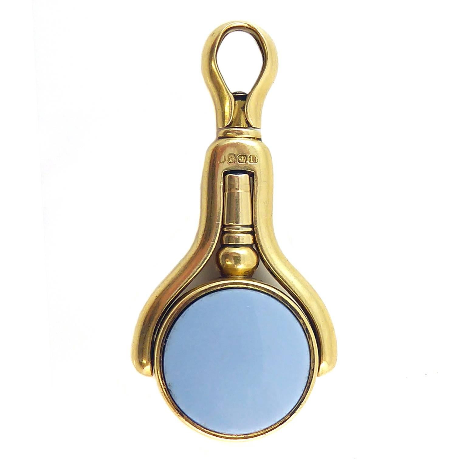 Details
1 x sardonyx
1 x bloodstone
Each approx.  16mm diamenter
18ct yellow gold

Victorian pocket watch seal fob set with a chamfered edge blood stone and sardonyx in an 18ct gold band.  The fob is attached to a gold frame within which it swivels