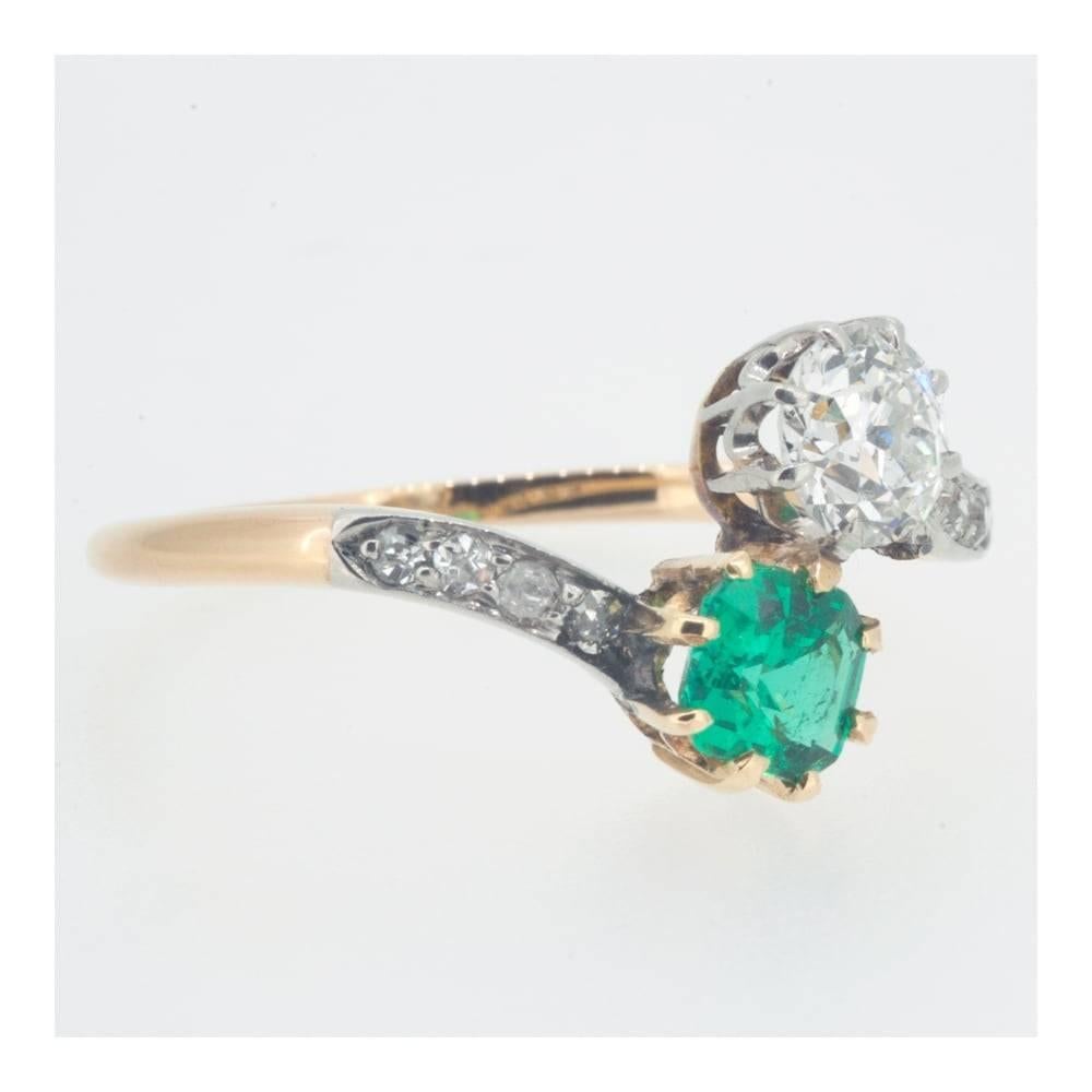 two stone emerald and diamond ring