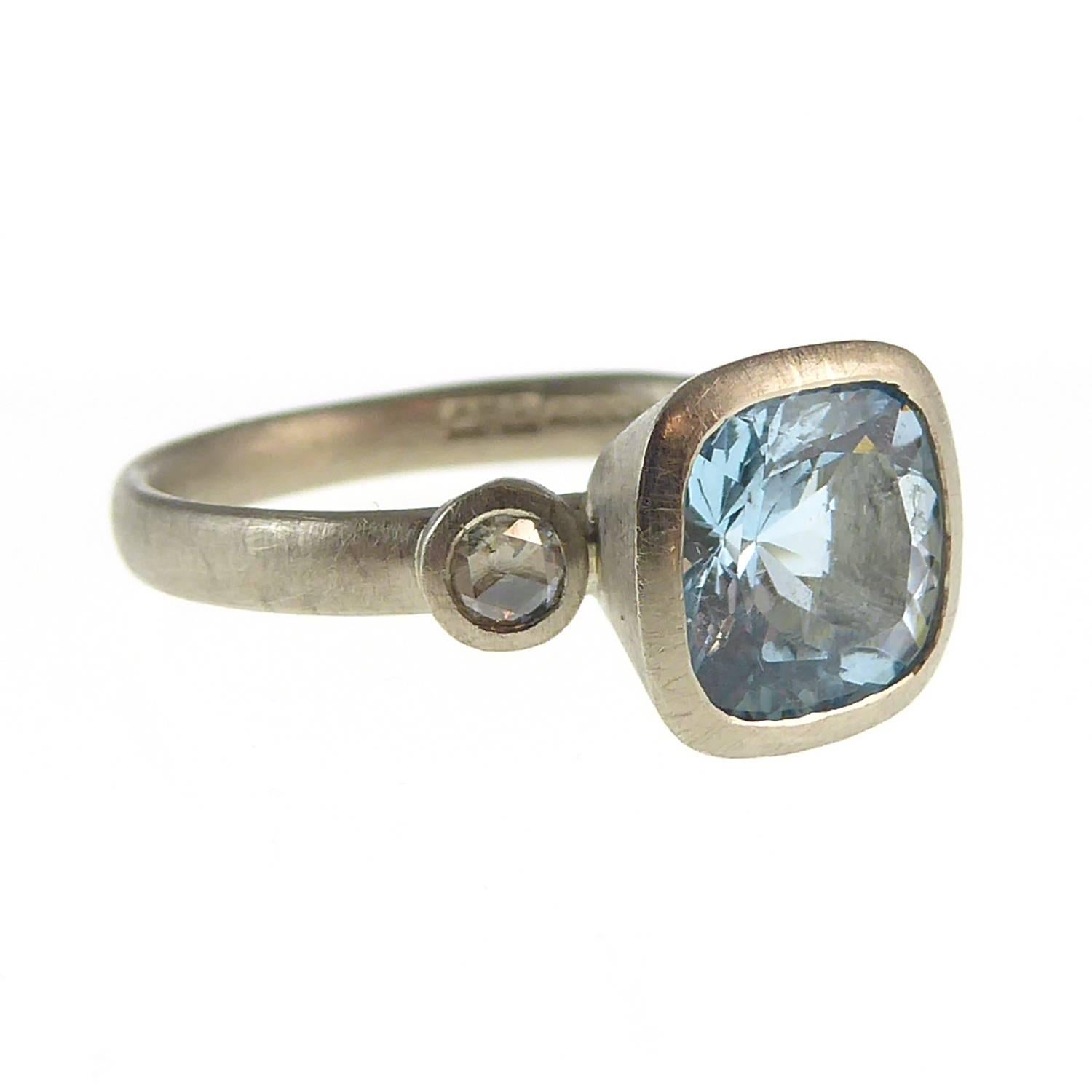 A beautifully hand-crafted aquamarine and diamond ring by Alex Goodman of the Goodman & Morris design team from the UK.

The design is known as the 