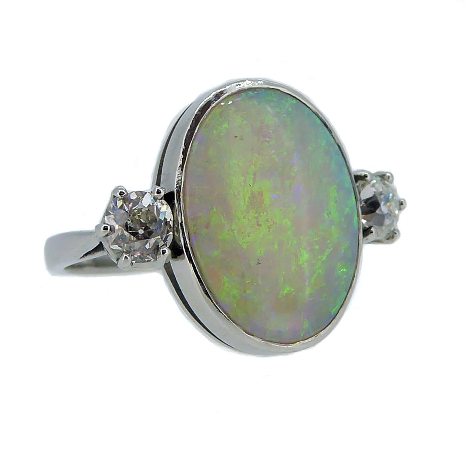 Created by Nicholsons Jewellers utilising antique diamonds and opal, the ring has been modelled in the ever-popular Art Deco style.  Stunning in its simplicity, by using a very plain mount we have allowed the beautiful colour play of the opal to be