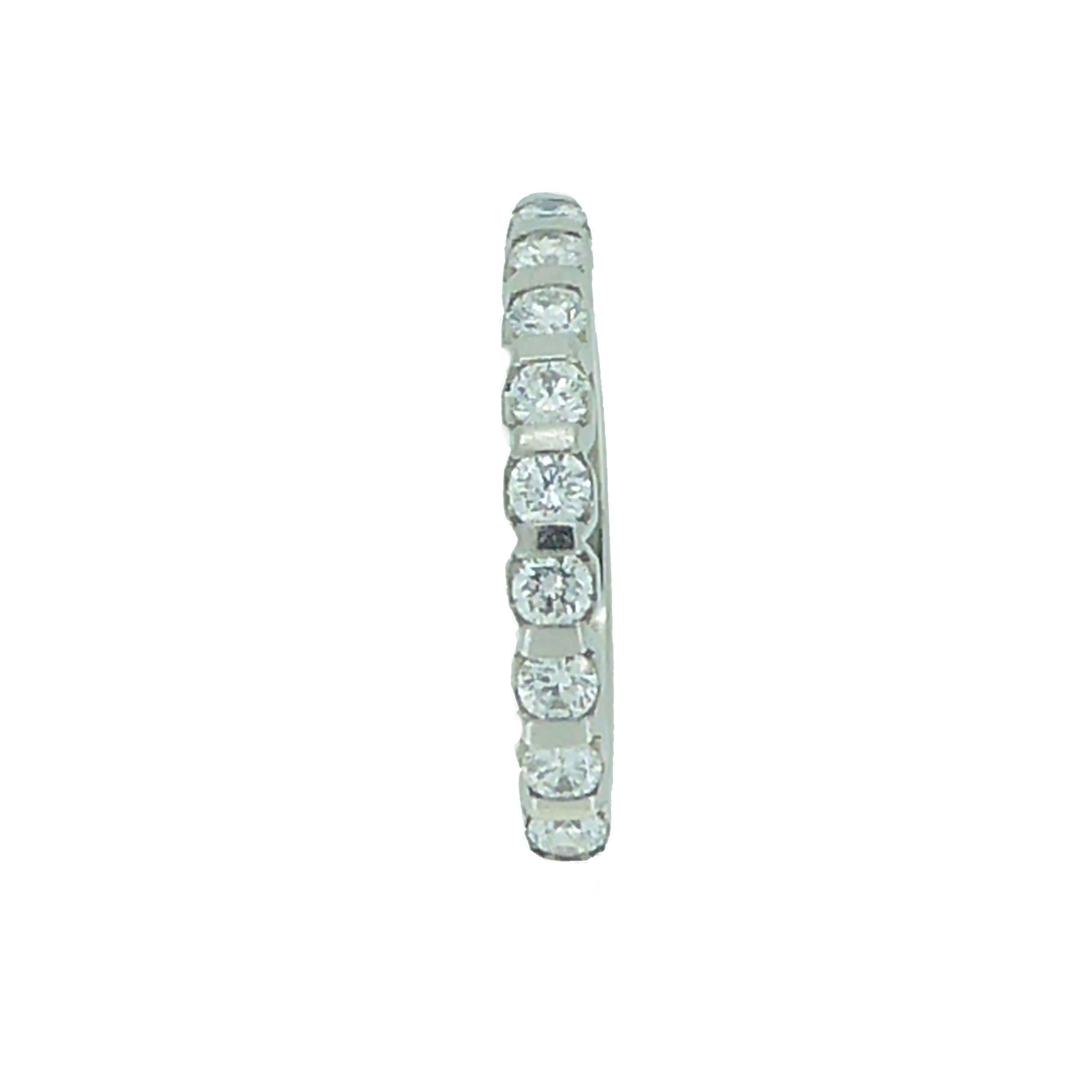 Fabulous as a wedding band or eternity ring, this ring is set with 9 diamonds on a smooth edged setting making it very comfortable to wear.  
The flat sides make a breeze to match to an engagement ring too, or even to create that contemporary