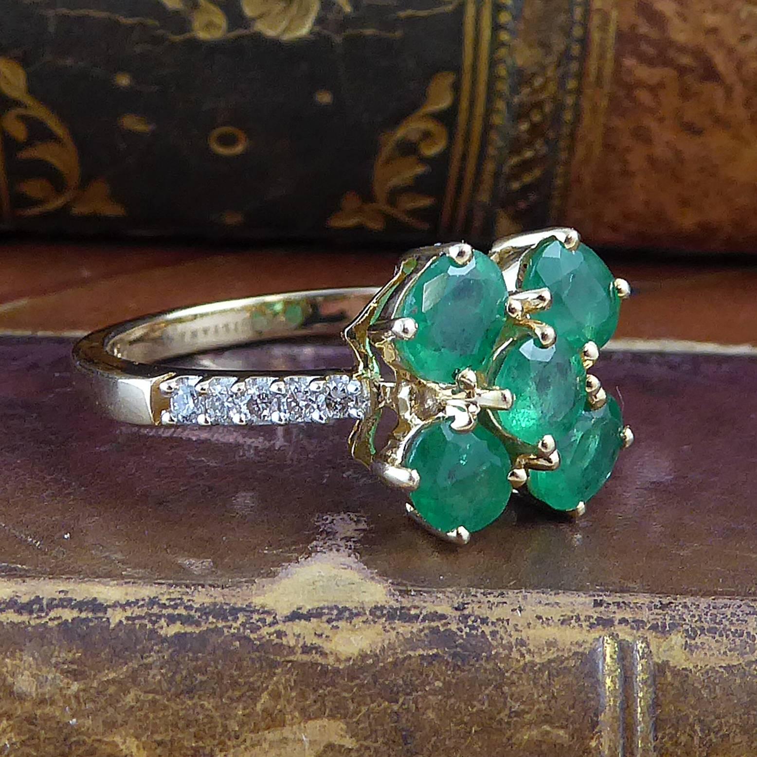 Oval Cut 1980s Vintage Emerald Diamond Cluster Ring, 18 Carat Gold, Diamonds Shoulders