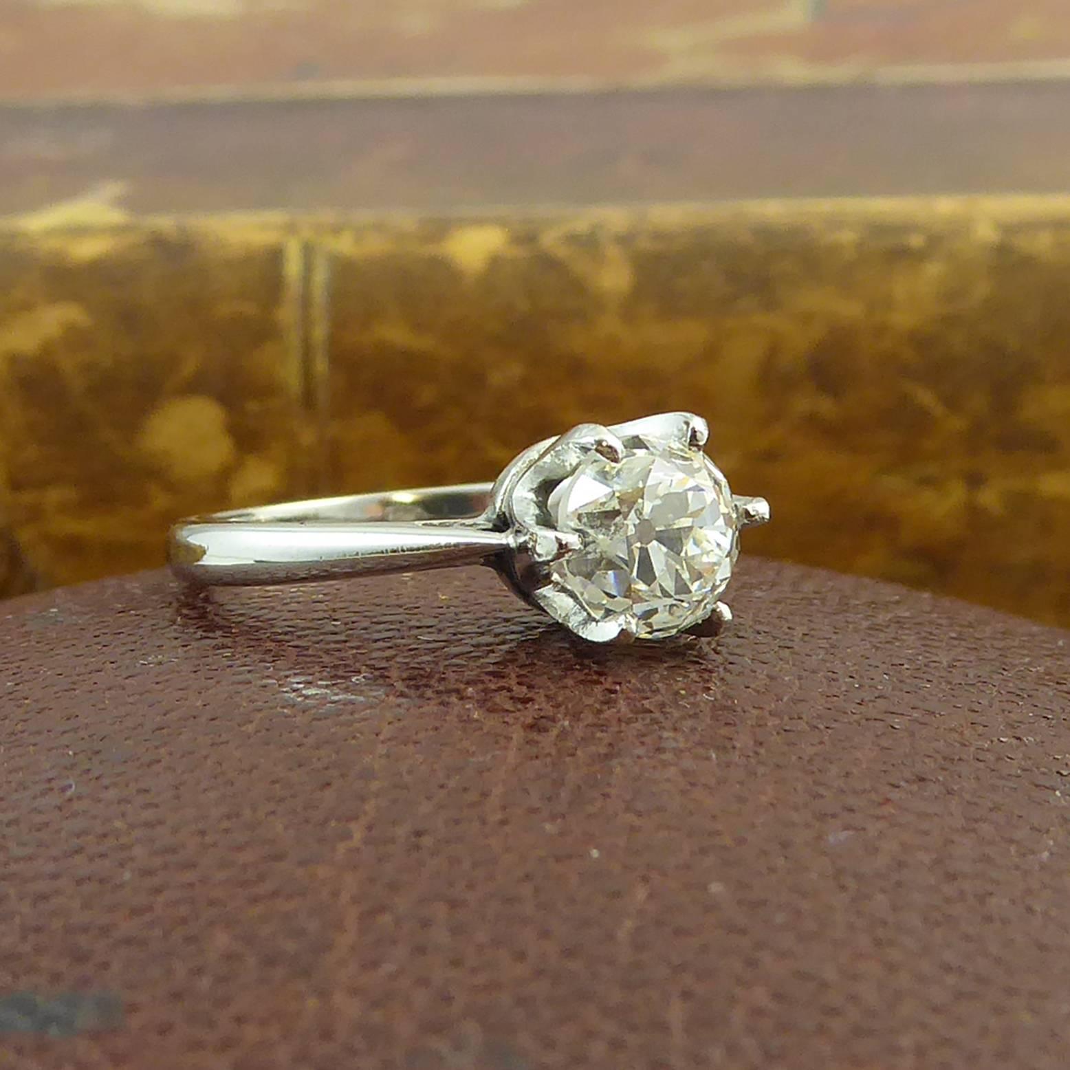 A single stone ring set with an oval old European cut diamonds measuring approx. 5.45mm x 5.59mm x 4.39mm deep.  Weighed carat weight of 1.02ct, assessed as VS clarity and G/H colour.  Claw setting in white, chenier inserted shoulders, plain