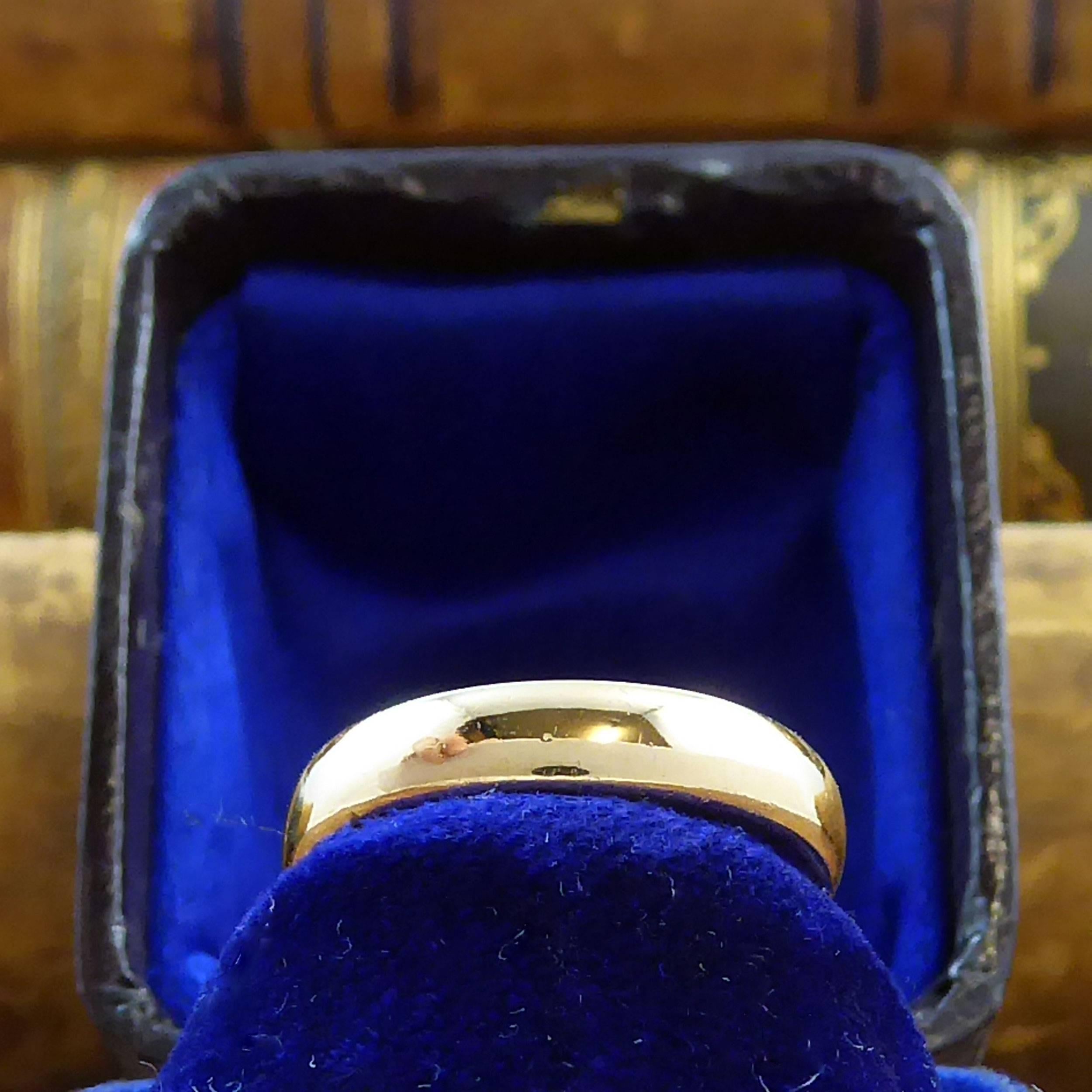 An Art Deco wedding band in 22 Carat yellow gold.  Hallmarked in 1929 at the Birmingham Assay Office in the UK, this beautiful little ring is so wearable both as it's intended purpose as a wedding ring or a simple and elegant everyday gold band.  A