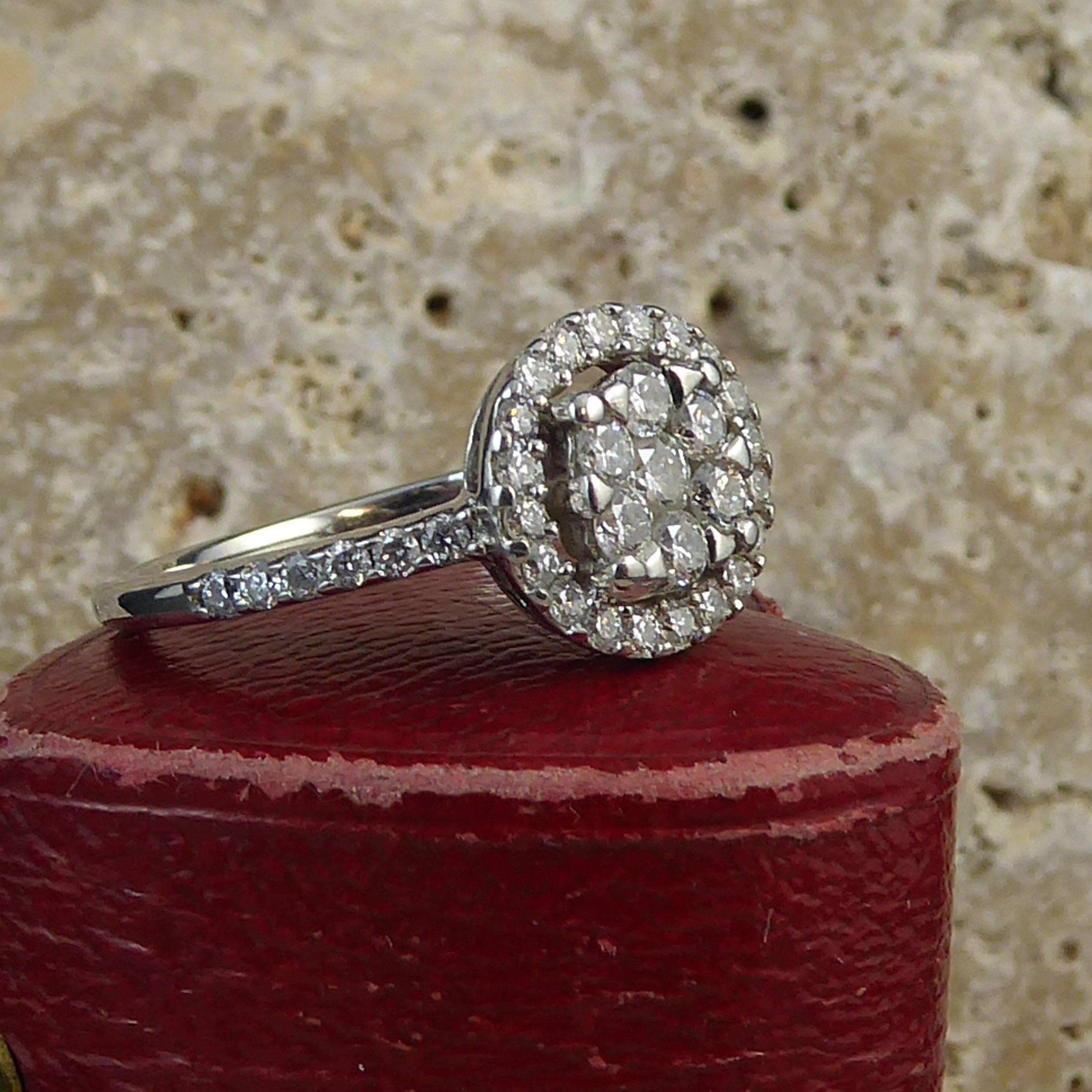 Round Diamond Cluster 18 Carat White Gold Engagement Ring In Excellent Condition In Yorkshire, West Yorkshire