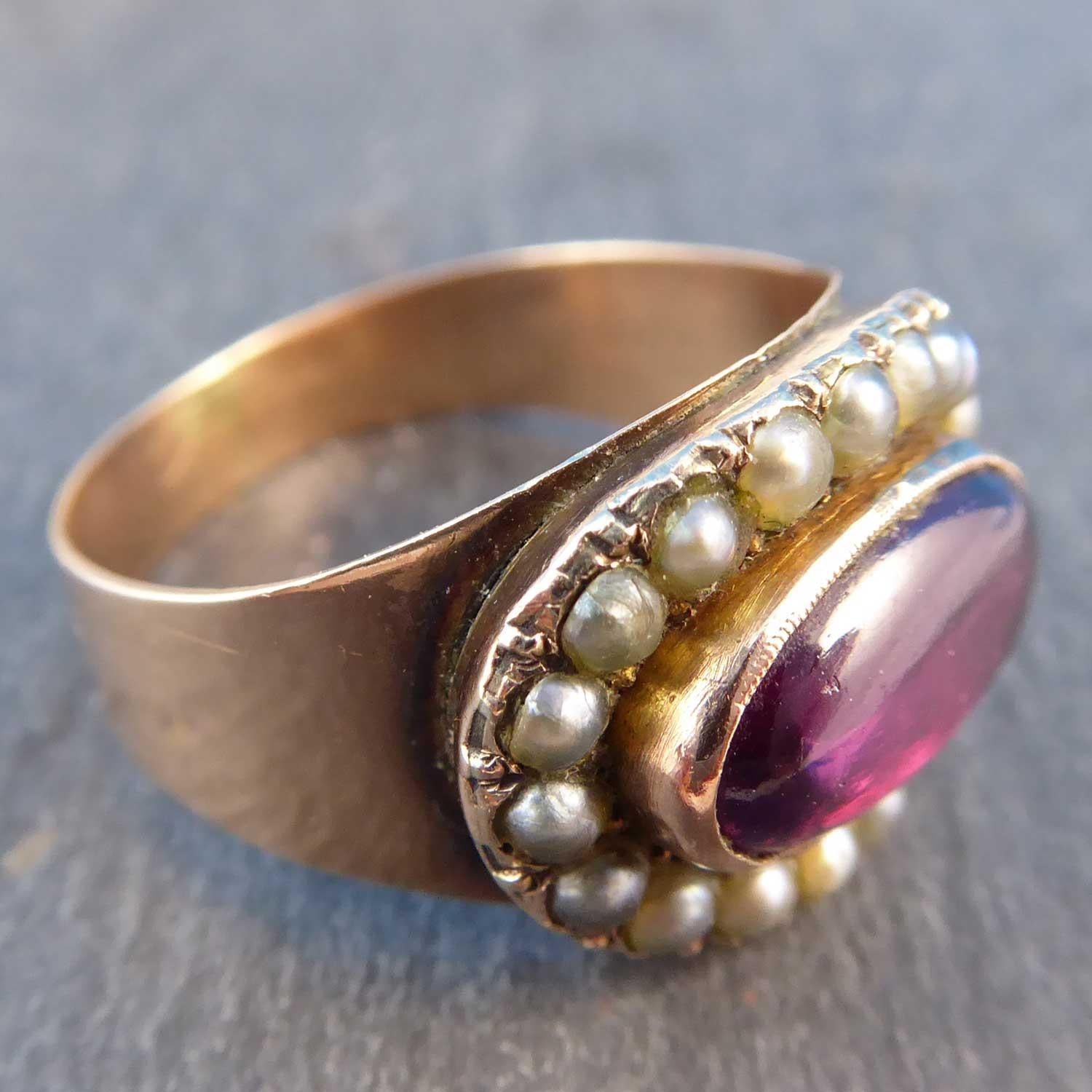 Oval Cut Antique Georgian Style Garnet and Pearl Cluster Ring, circa 1850s