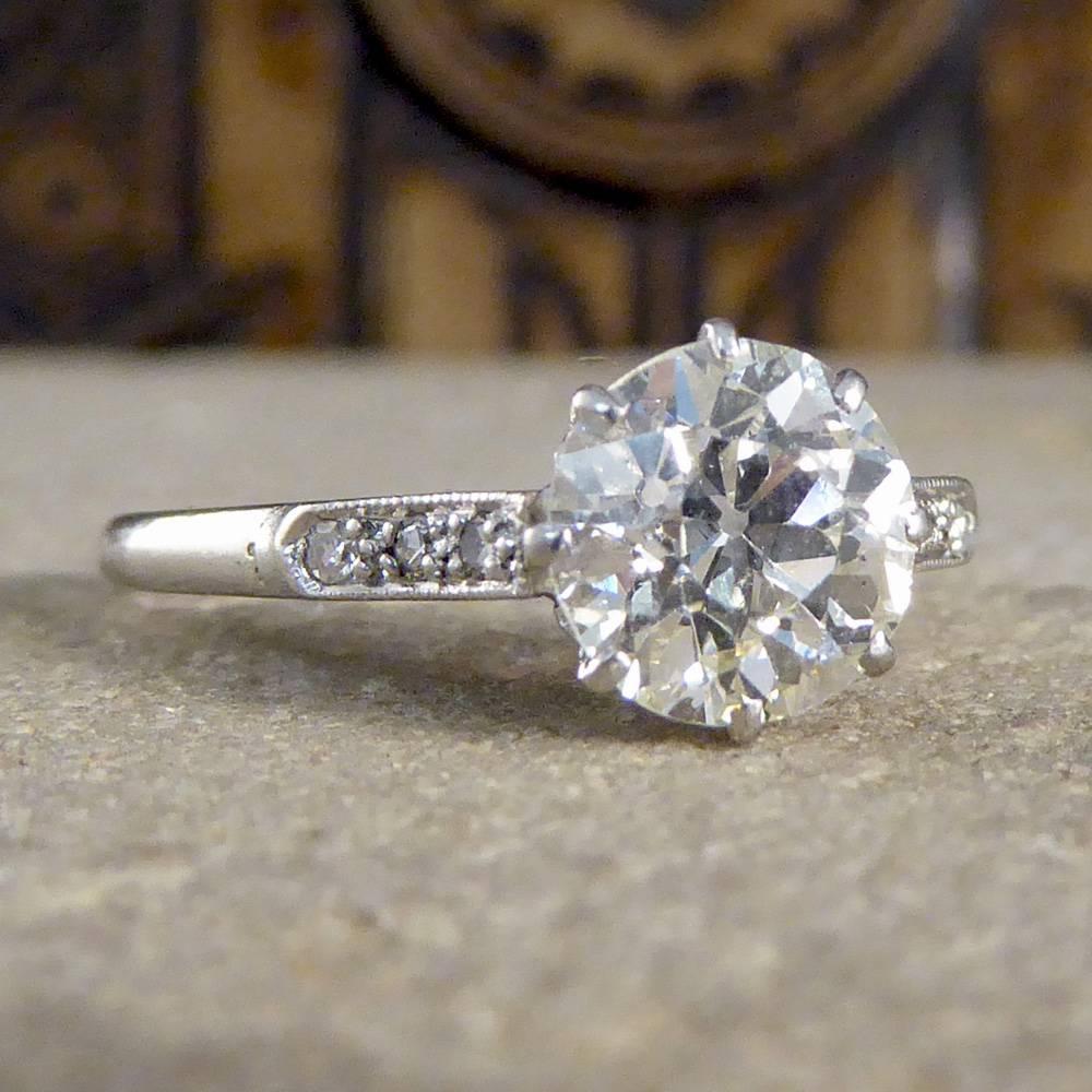 This beautiful 1.15ct diamond solitaire ring was crafted in the art deco era. It features diamond set shoulders and is set in 18ct white gold and platinum.

Exquisitely divine, it would make the perfect engagement ring!

Ring Size: UK L 1/2 or US 6