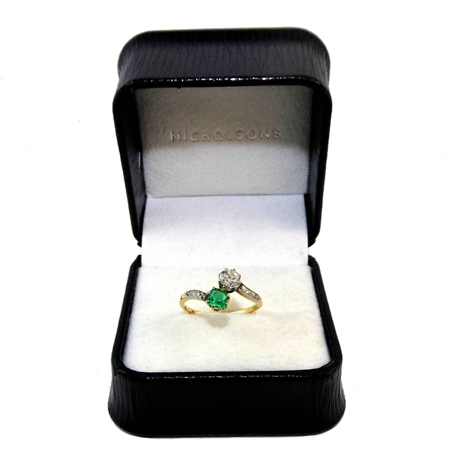 emerald two stone engagement ring