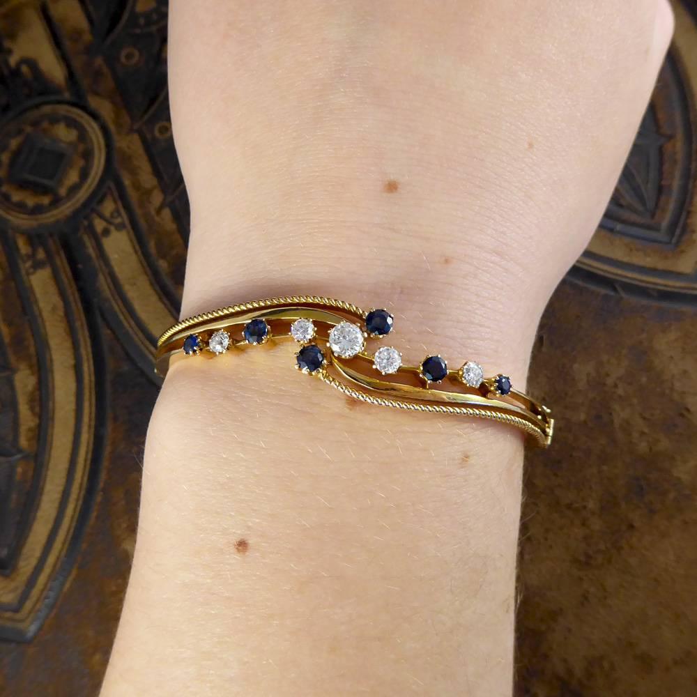 Antique Edwardian Diamond and Sapphire Bangle Bracelet in 15 Carat Gold In Good Condition In Yorkshire, West Yorkshire