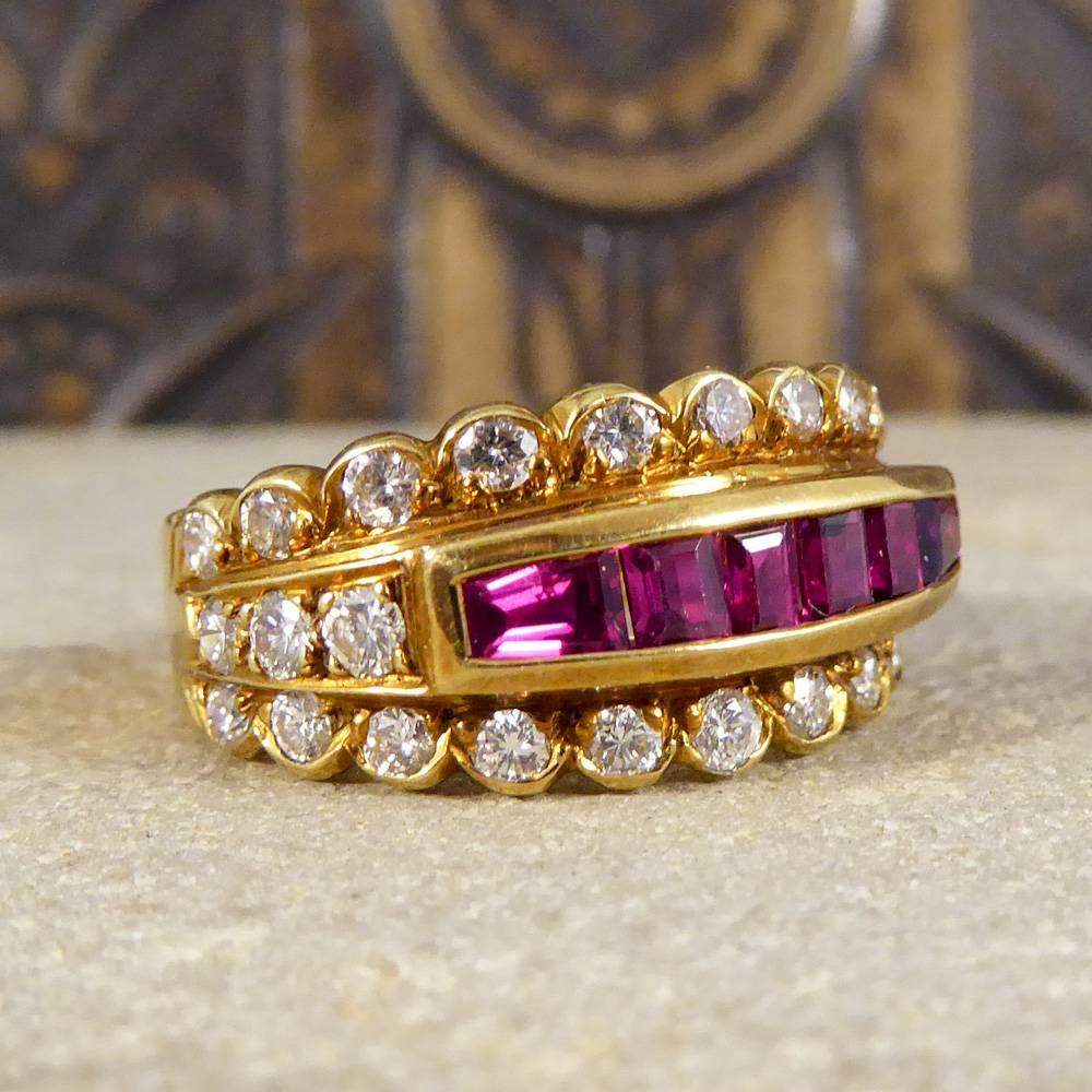 This Contemporary Ring features a central row of calibre cut rubies surrounded by an upper and lower row of dazzling diamonds. A true stand out ring set in 18ct yellow gold, it will add style and flair to any outfit!

Ring Size:UK P or US 7.75