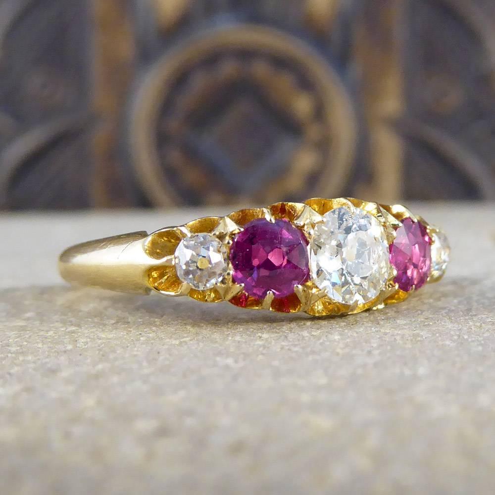 This delightful antique ring features two rubies and three diamonds. Modeled in 18ct yellow gold it looks delicate and divine on the hand!

Ring Size: UK L 1/2 or US 6

Condition: Very Good, slightest signs of wear due to age and use

Defects: