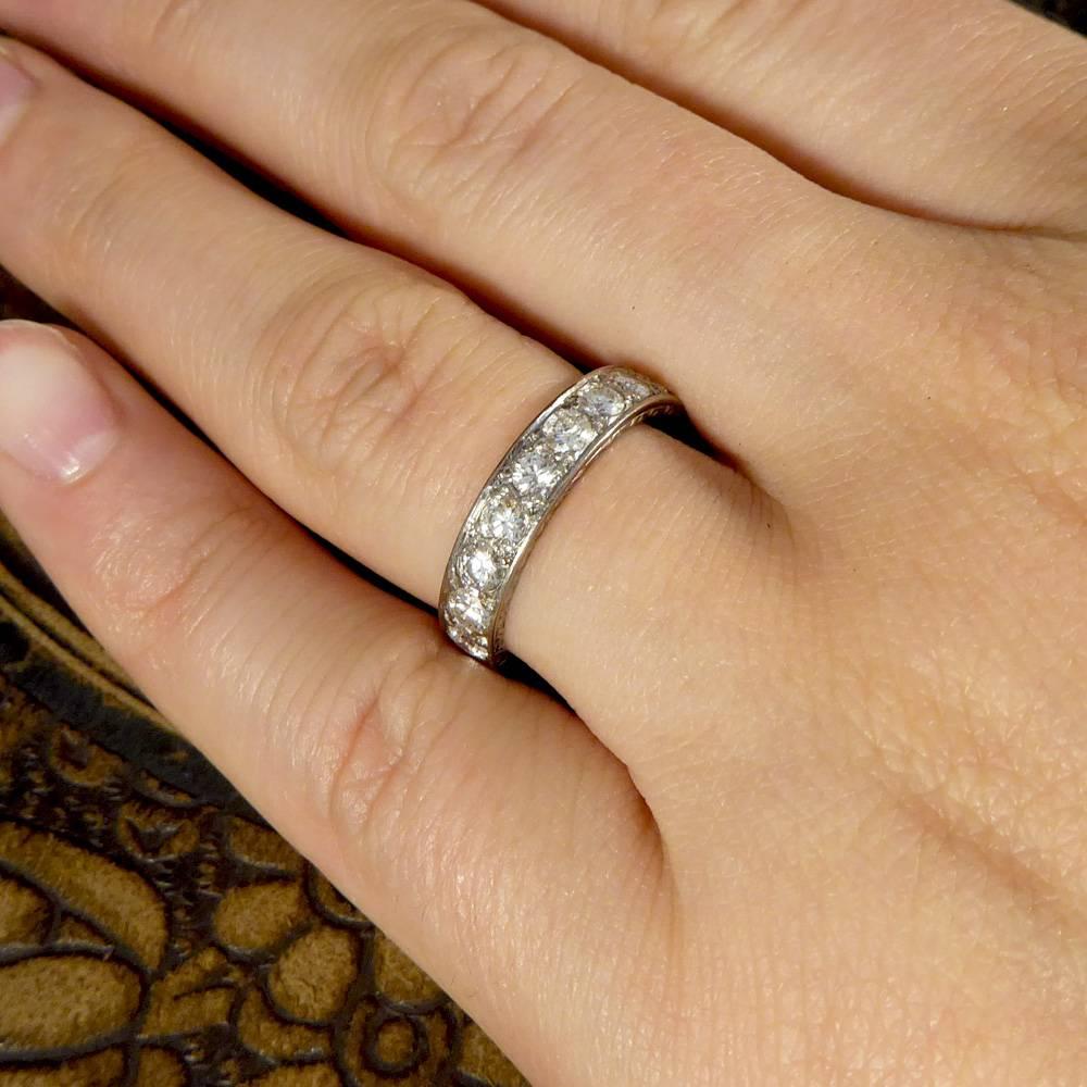 This exceptional, beautiful and impressive Art Deco full eternity ring has been crafted in 18ct White Gold with simple and elegant detailed design around the side of the ring. Set with 20 Brilliant Cut Diamonds weighing 0.10cts each with a total of