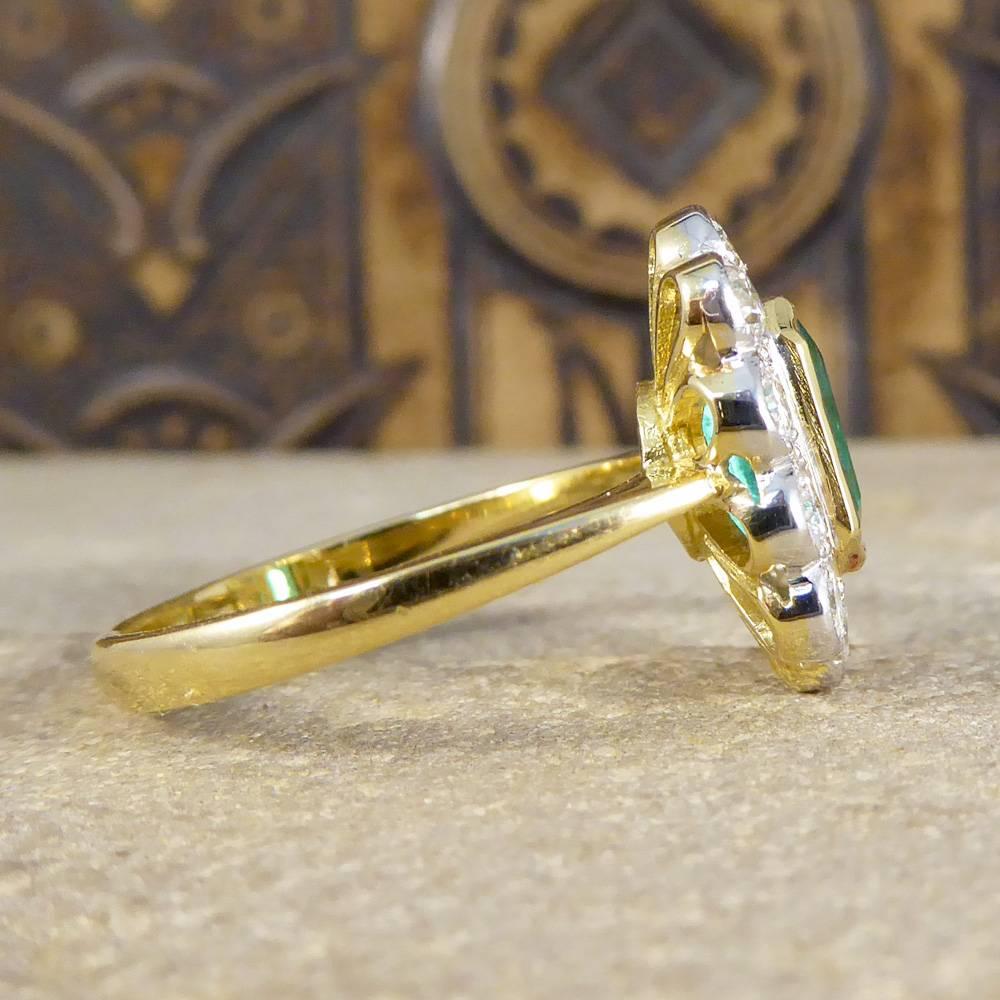 18ct gold emerald and diamond cluster ring