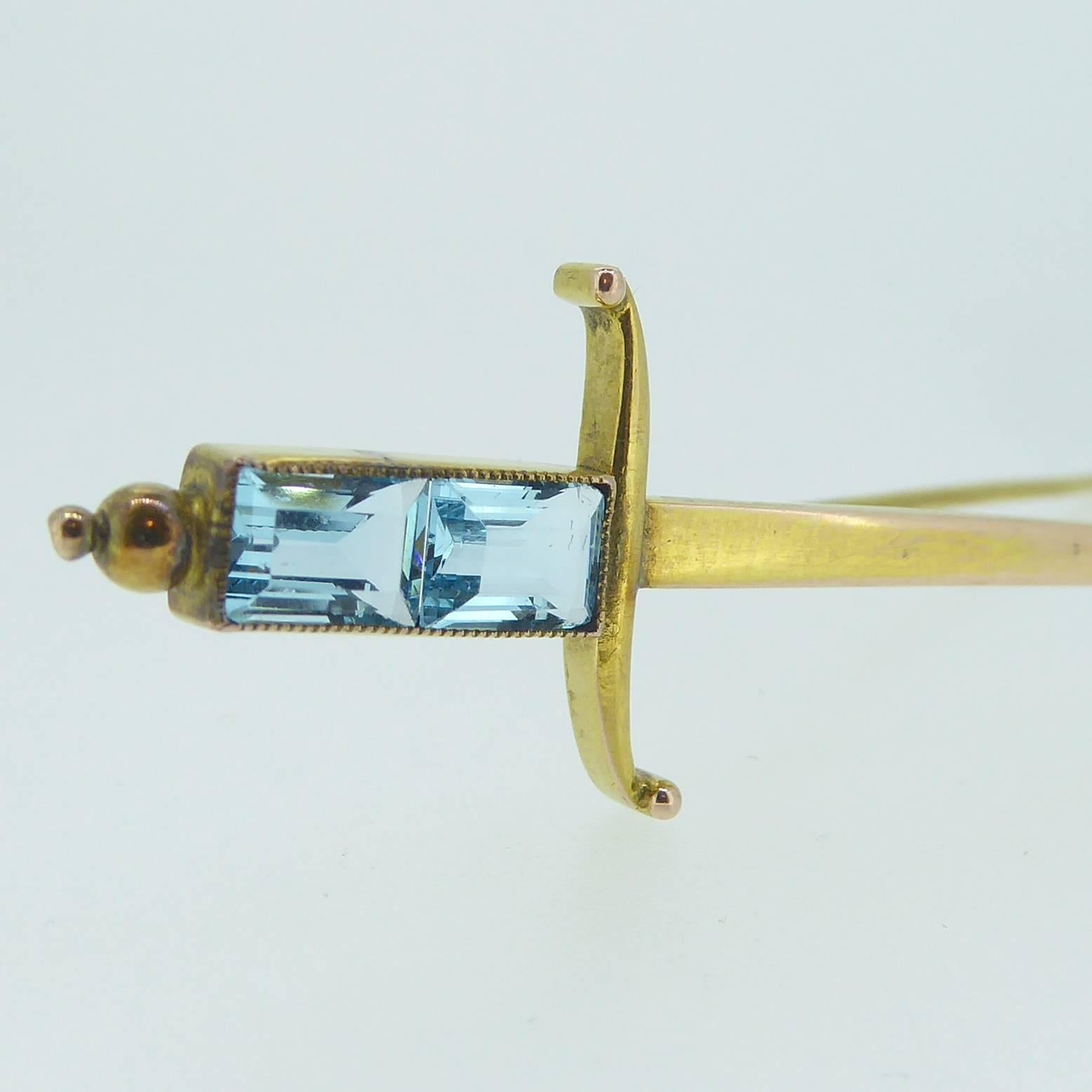 Women's or Men's Edwardian Dagger Brooch in 9 Carat Gold with Blue Emerald Cut Paste Gemstones
