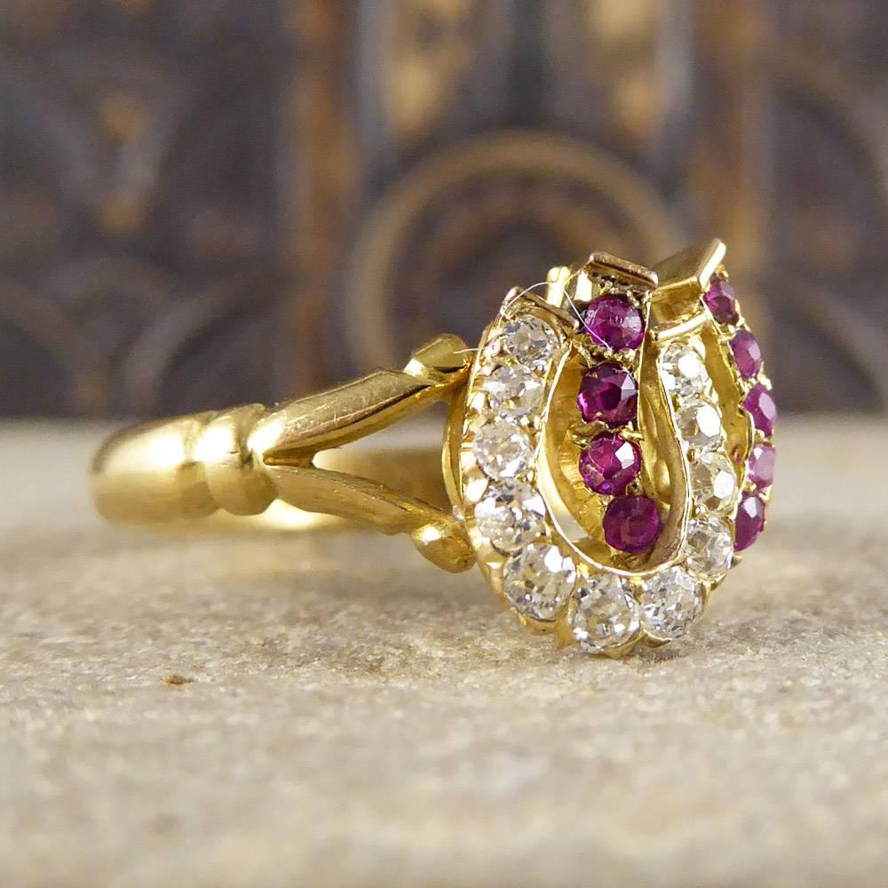 Complete your look with this double horseshoe ring set with ruby and diamond stones.
Crafted in the Edwardian era and set in 18ct yellow gold, it looks delightful on the hand!

Ring Size: UK L 1/2 or US 6 

Condition: Very Good, slightest signs of