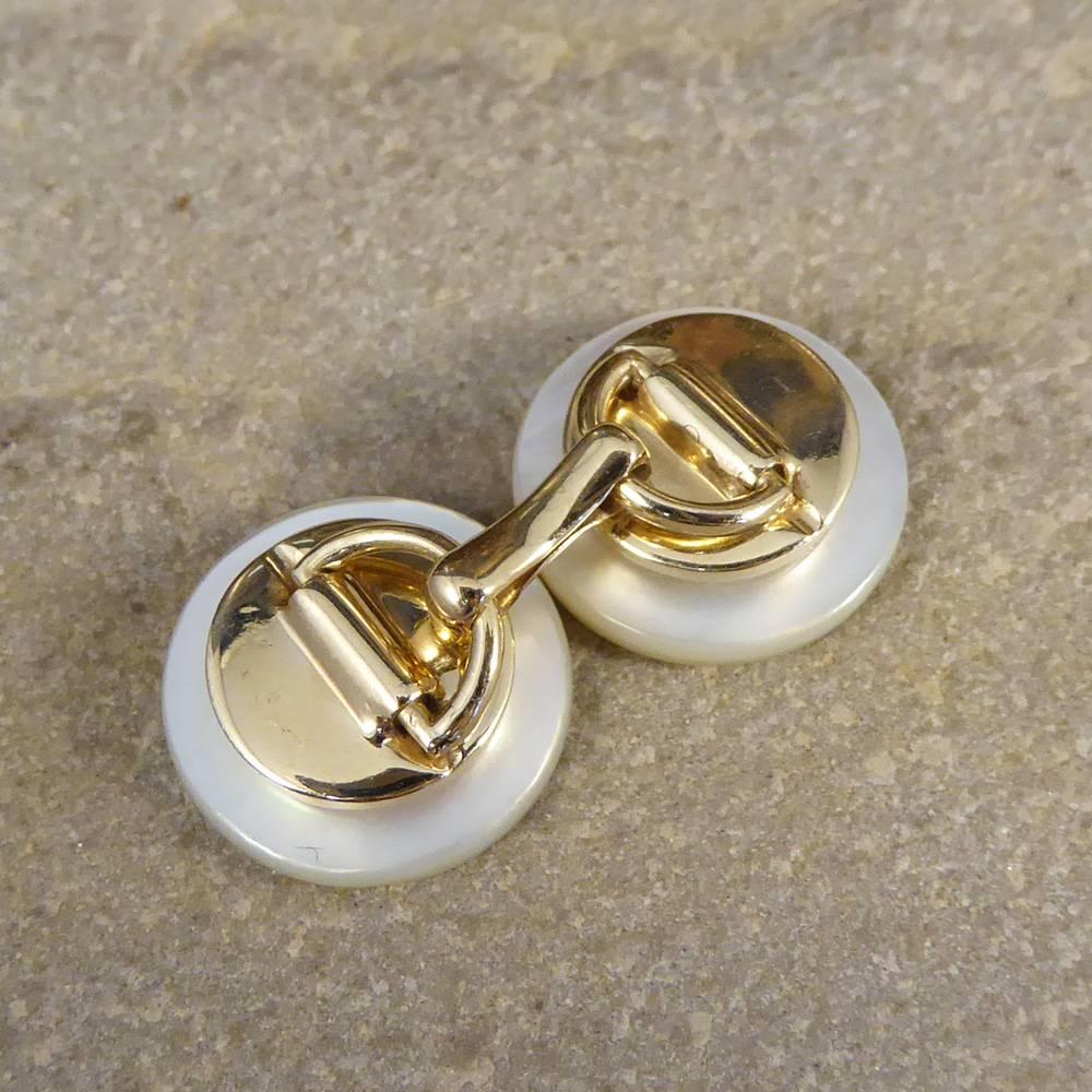 Such a smart and classic pair of cufflinks which are crafted in 14ct white and yellow Gold and have been set with round plaques of mother of pearl. Being so neutral, these cufflinks will compliment any outfit, with that extra touch of having a