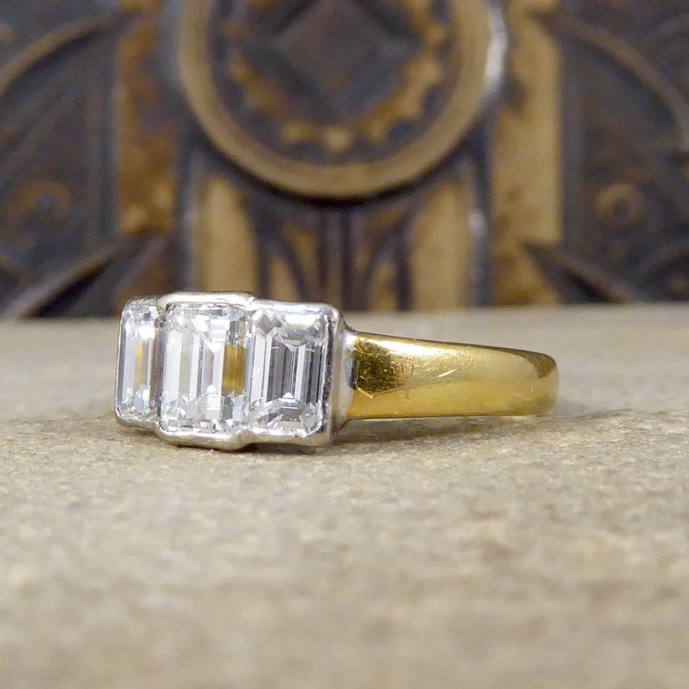 Modern Emerald Cut Diamond Three-Stone Engagement Ring in 18 Carat Gold 1