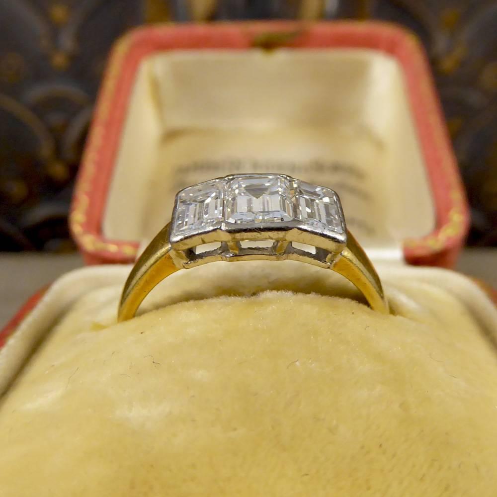 Modern Emerald Cut Diamond Three-Stone Engagement Ring in 18 Carat Gold 6
