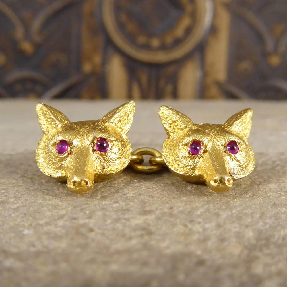These Cufflinks were typically used in the Edwardian era by men whilst hunting, accompanied by a matching pin or brooch, see product code NJWBR57. These handsome cufflinks have been hand crafted in 15ct Yellow Gold with Cabochon Ruby set eyes. The