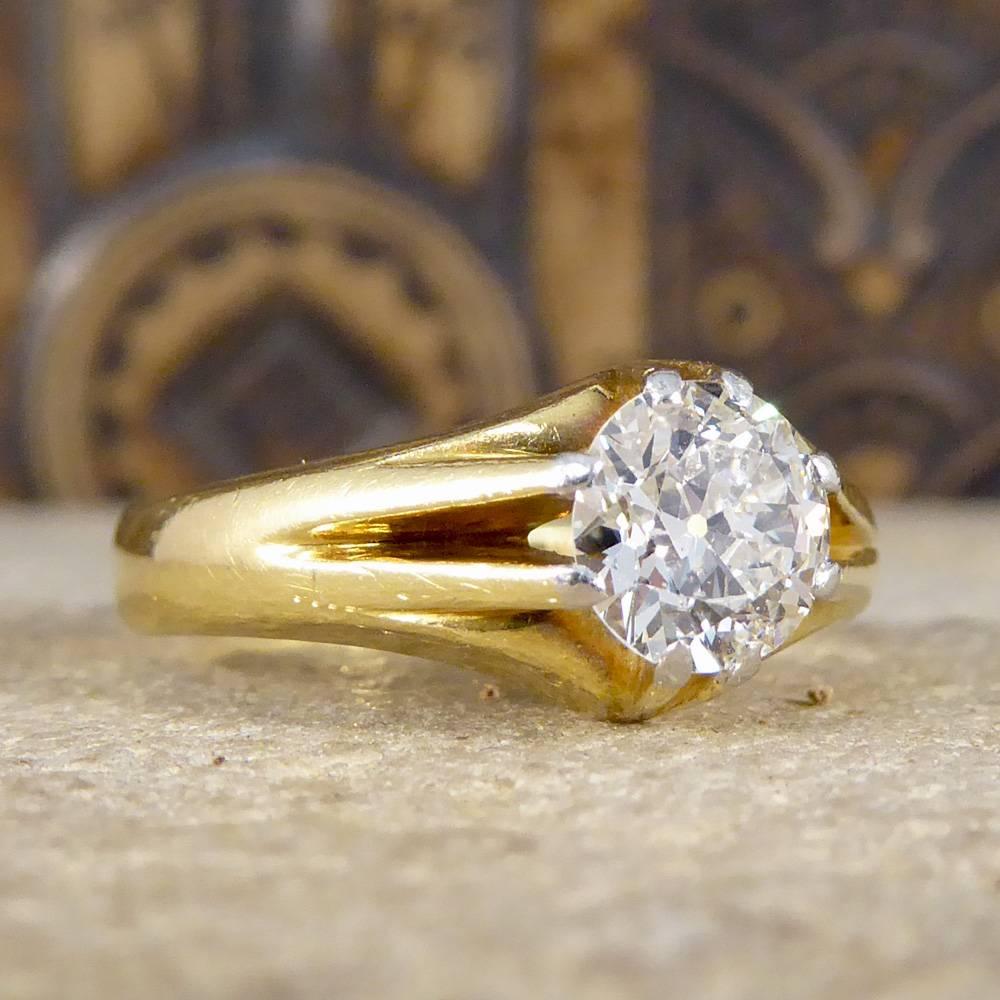 This gypsy set ring can be worn by men and women alike. Crafted in the Victorian era it was made out of 18ct Yellow Gold with Platinum tips holding the Diamond securely into place. Centred with a bright round European cut Diamond that is both clear